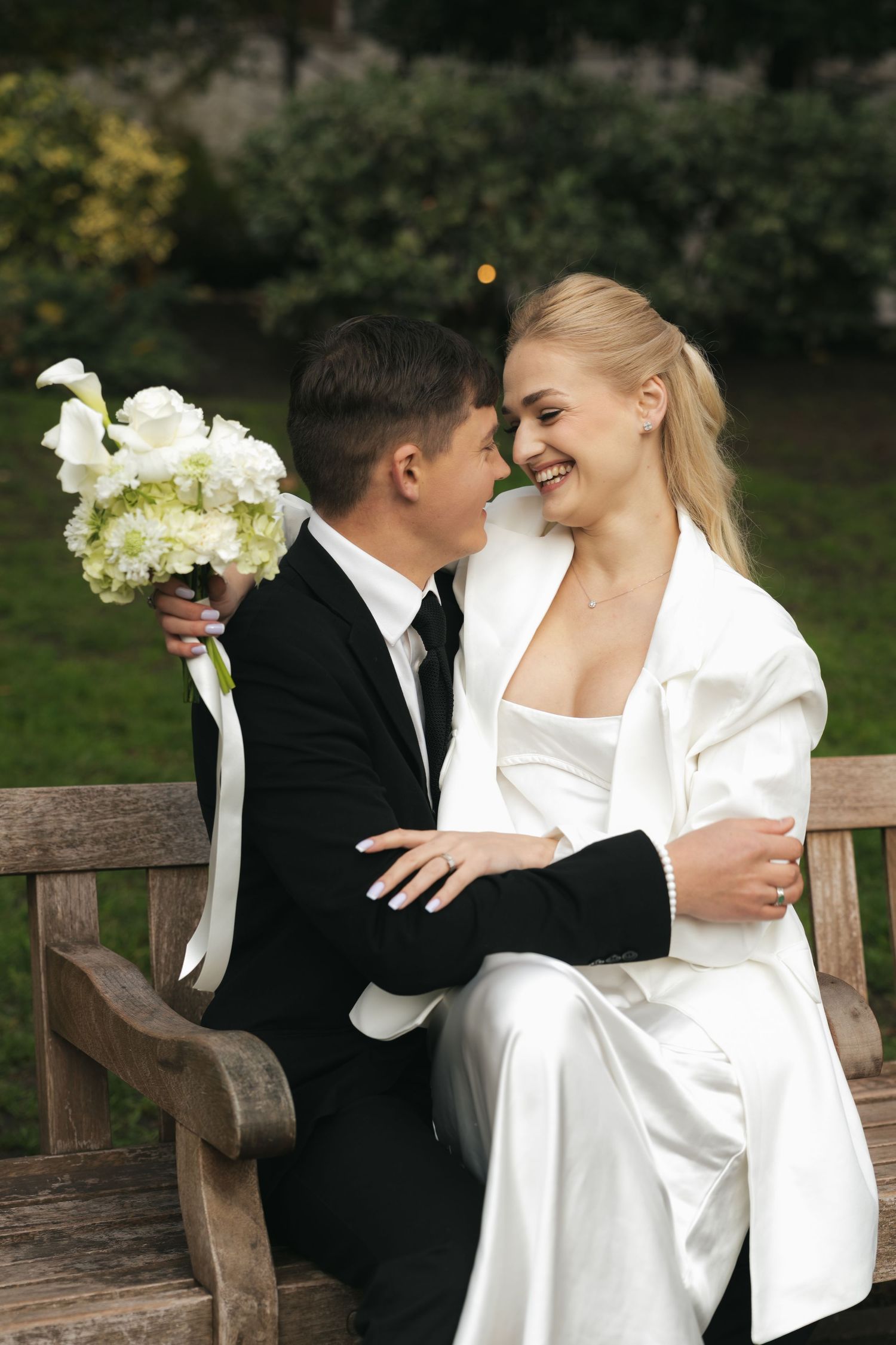 “Couple photographed in Victoria Embankment Gardens during a London city session.”