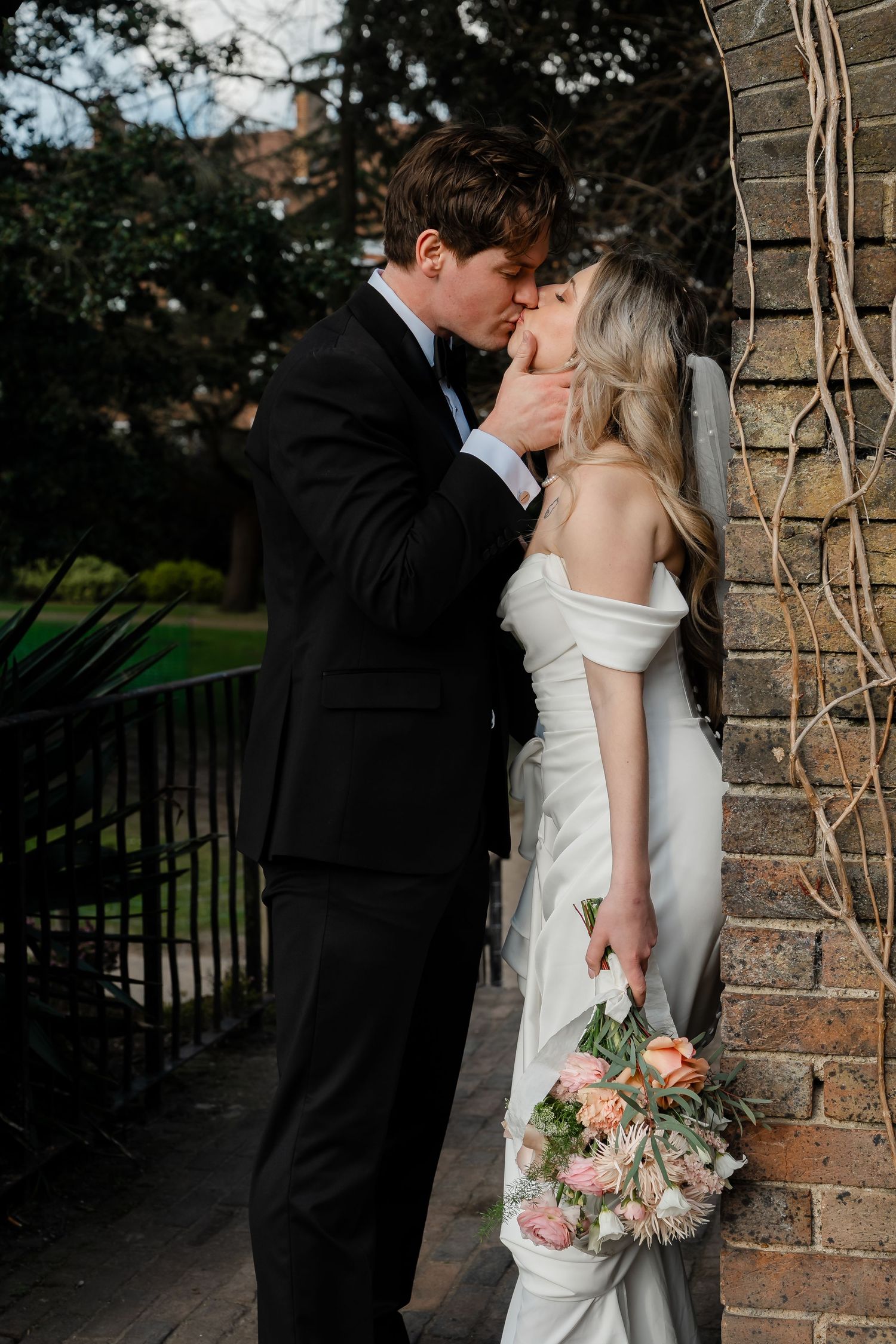 Bride and groom under the York House archway
