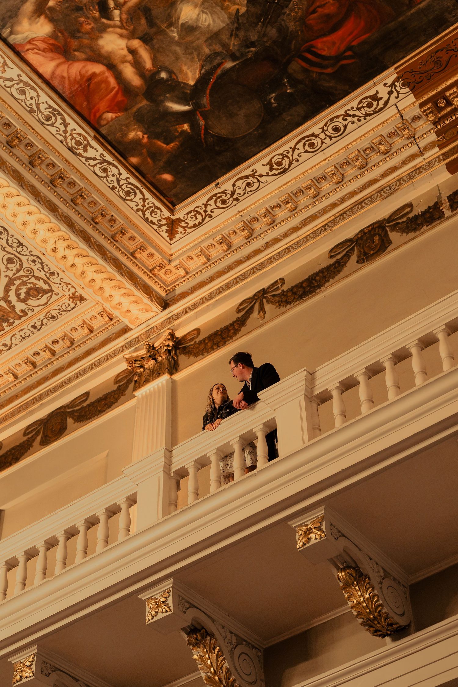 Romantic engagement portraits on Banqueting House balcony after surprise London proposal
