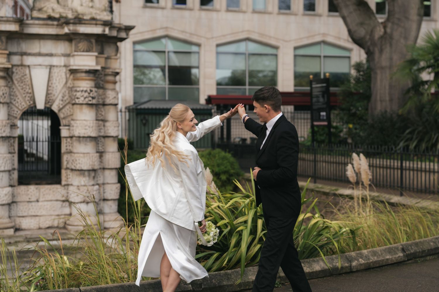 “Couple photographed in Victoria Embankment Gardens during a London city session.”