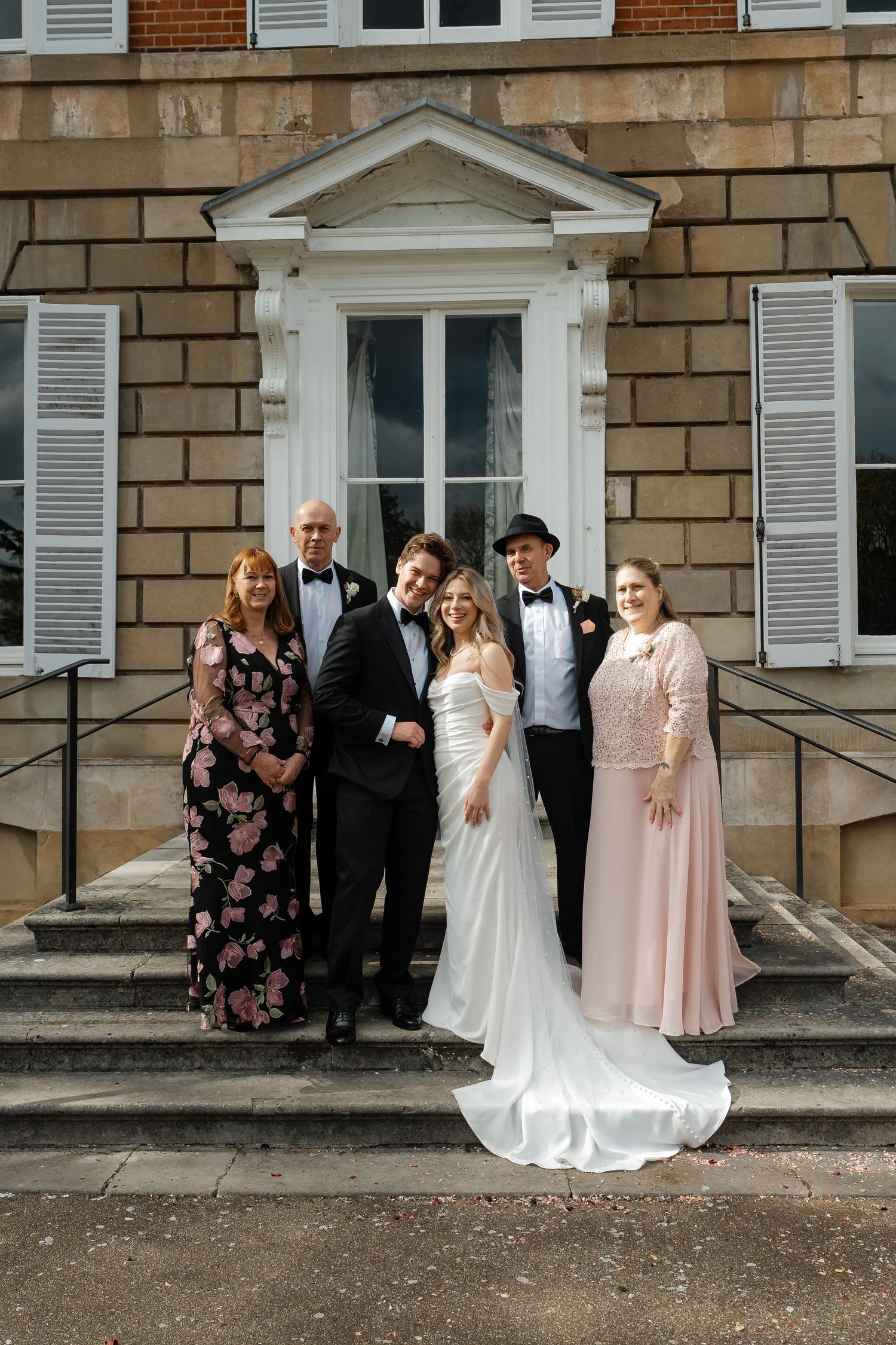 Family group portraits with York House architecture in background