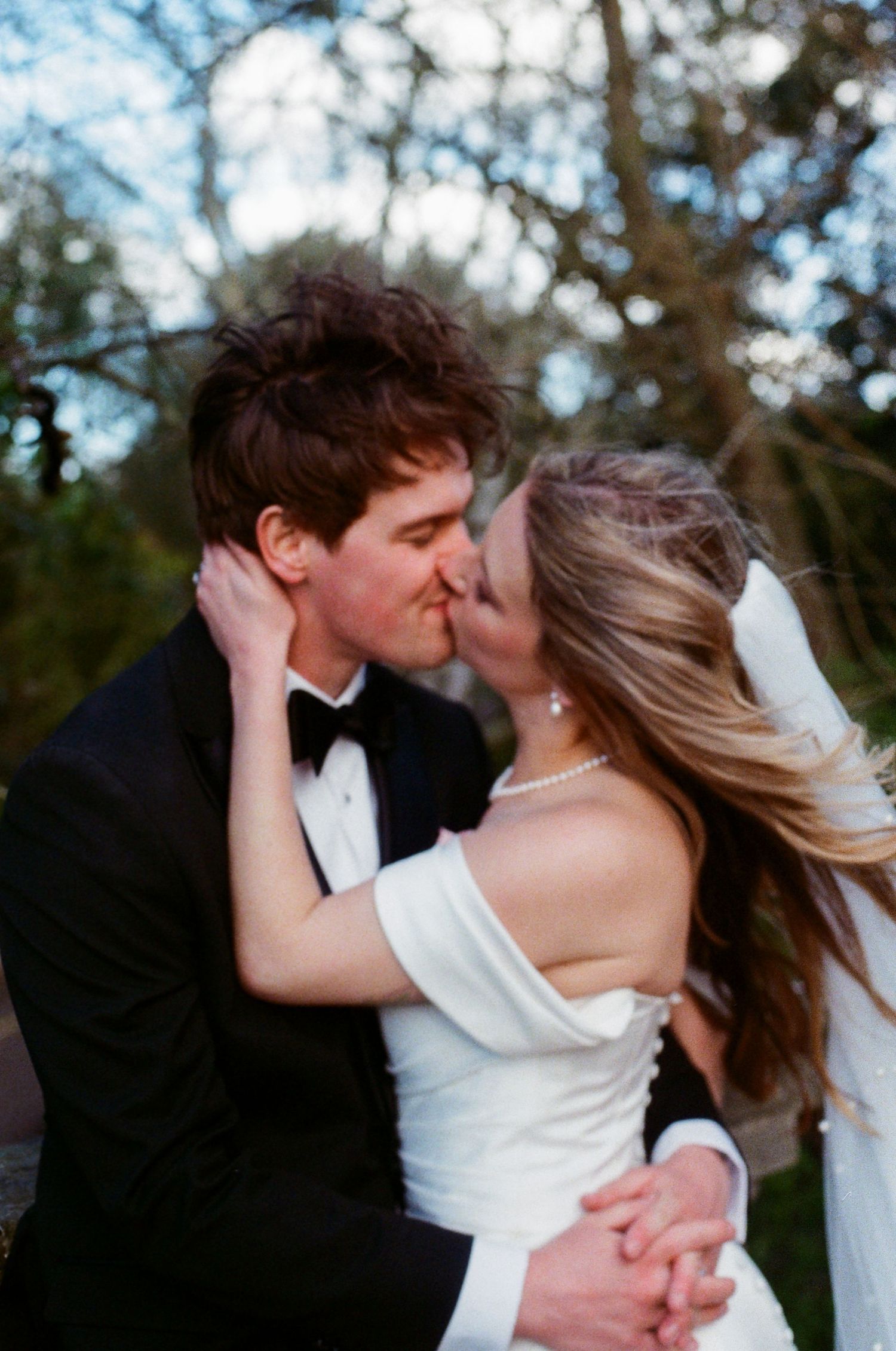 Romantic couple portrait on bridge at York House gardens
