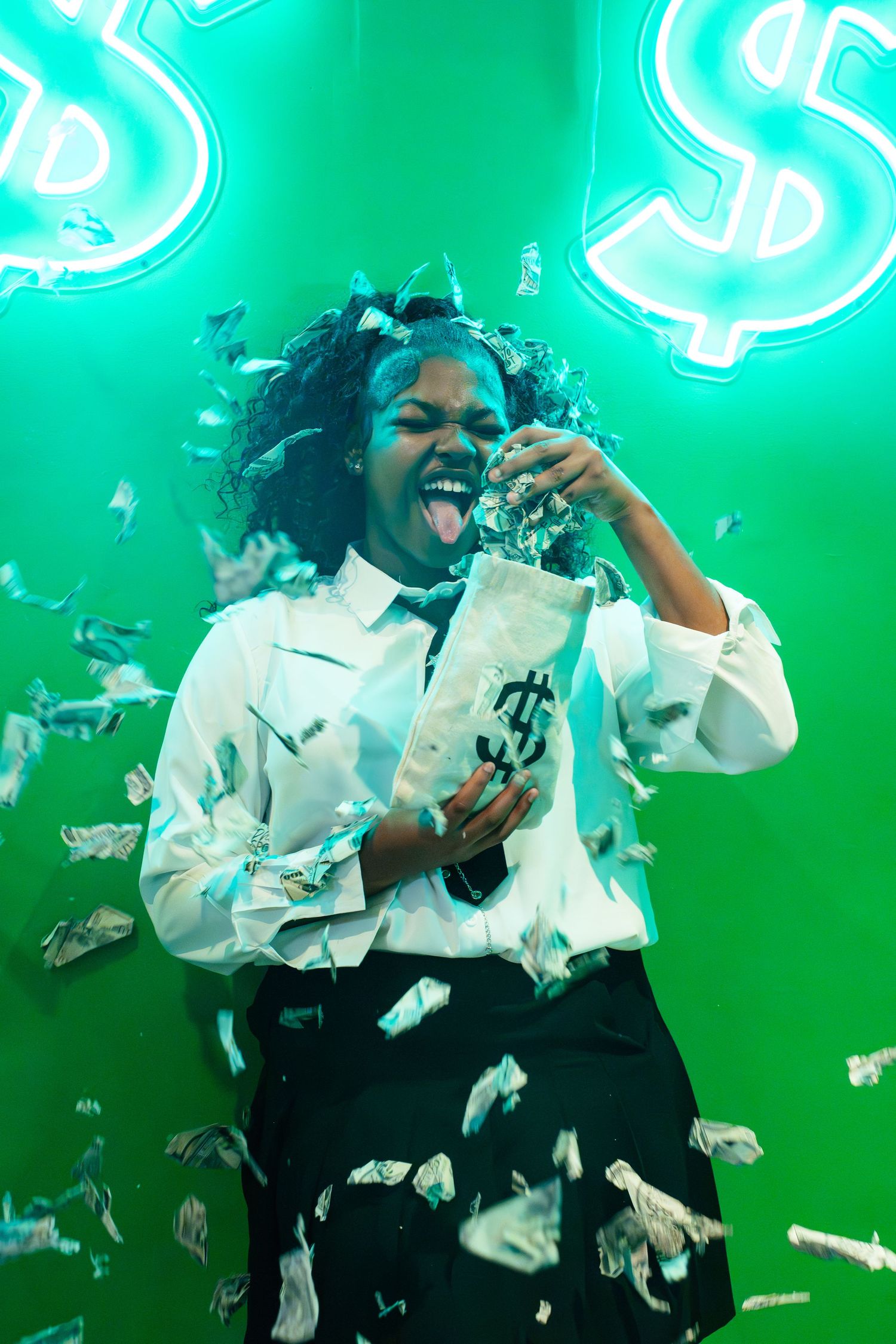 Energetic scene with falling money and neon dollar signs in green lighting creating celebratory atmosphere.