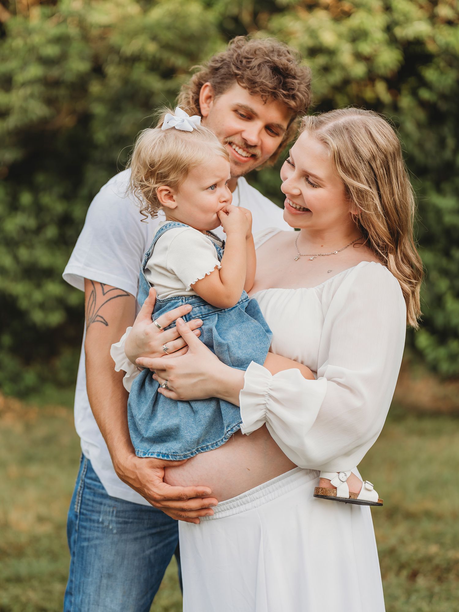 Couple with baby outdoor family portrait session Waco TX Sudden Joy Visuals