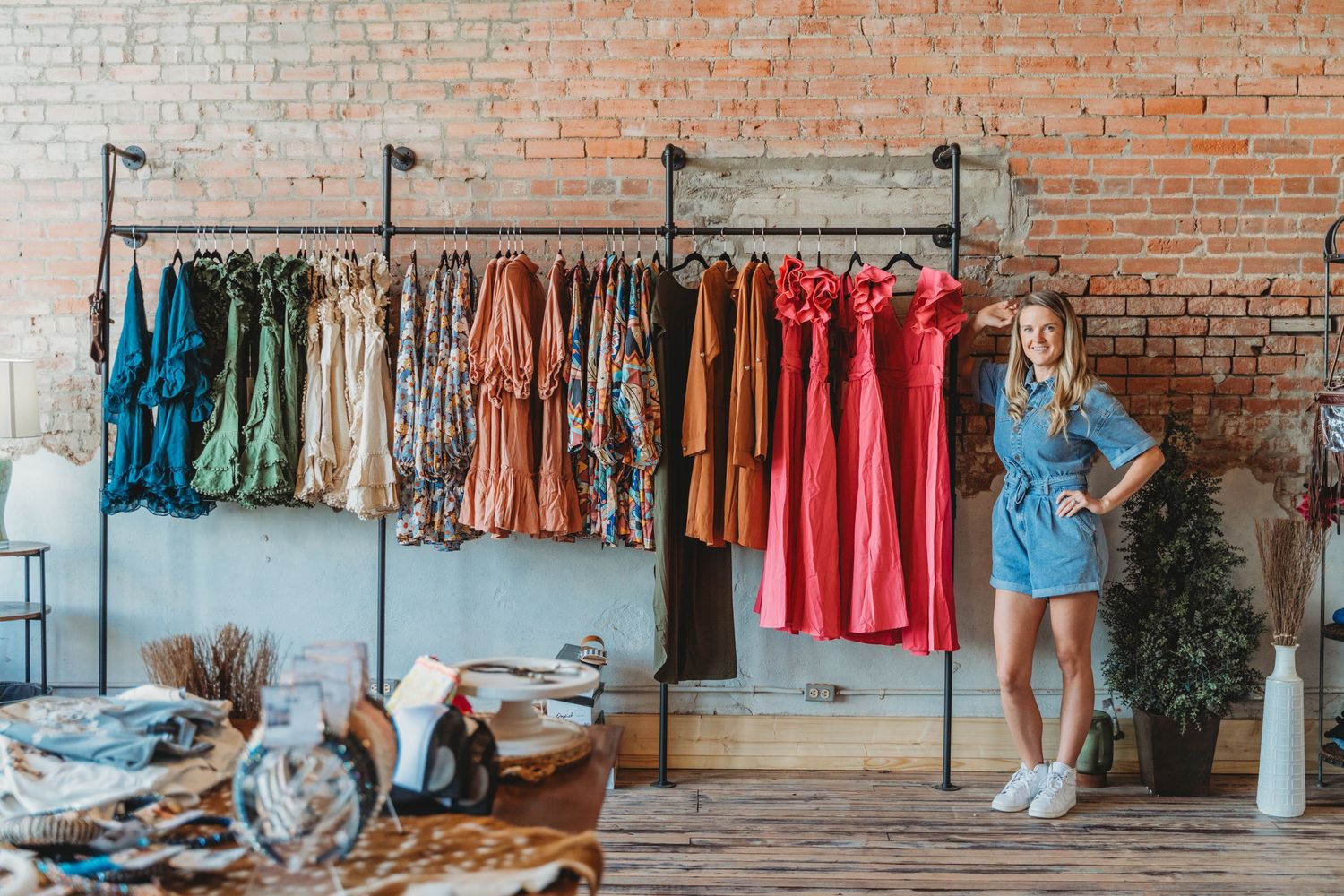 Female boutique owner personal branding session clothing rack Waco TX Sudden Joy Visuals