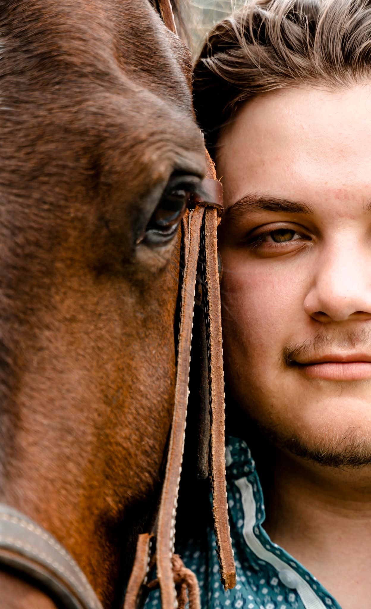 Young man with horse portrait outdoor Central Texas Sudden Joy Visuals