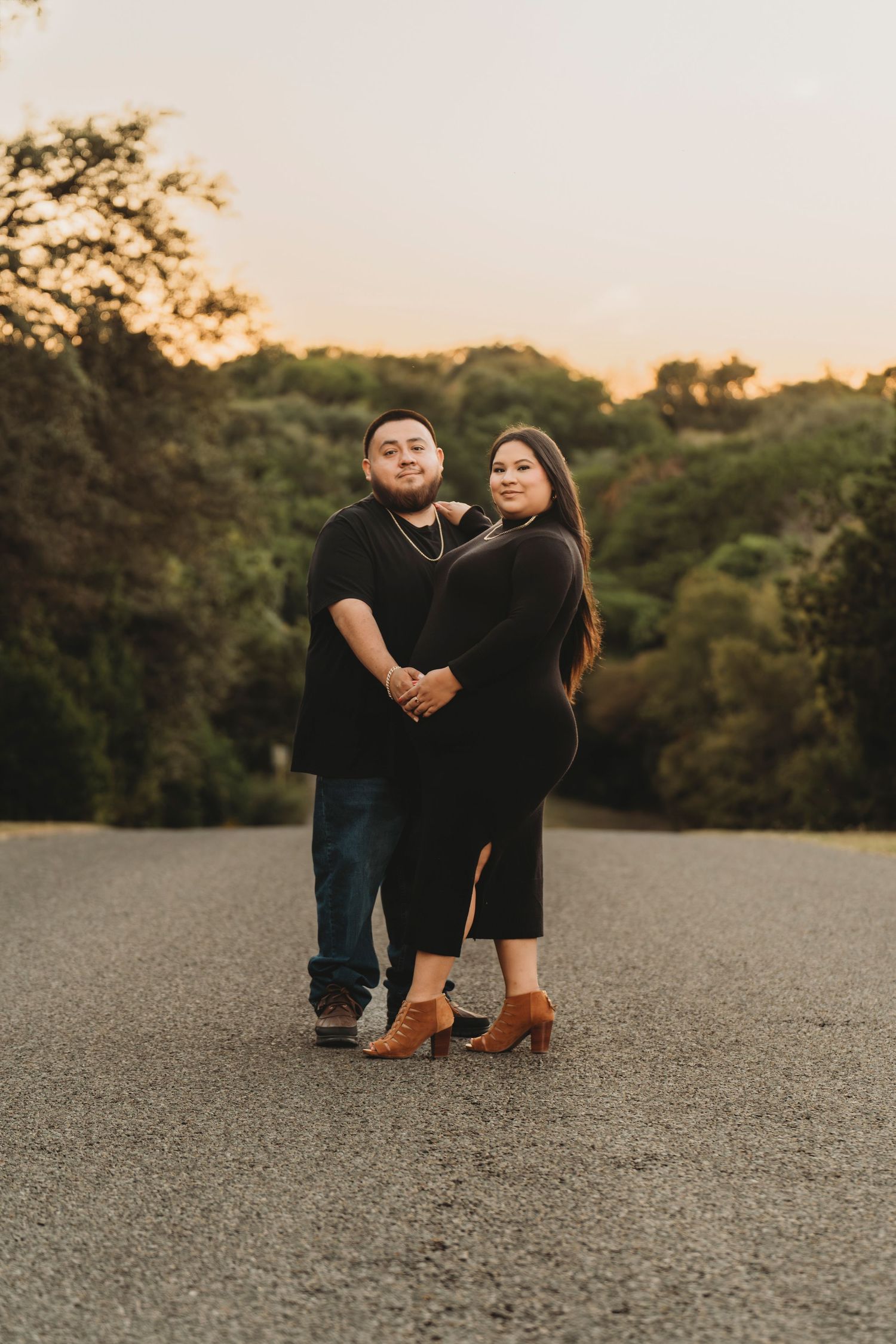 Maternity couple golden hour road portrait Central Texas Sudden Joy Visuals