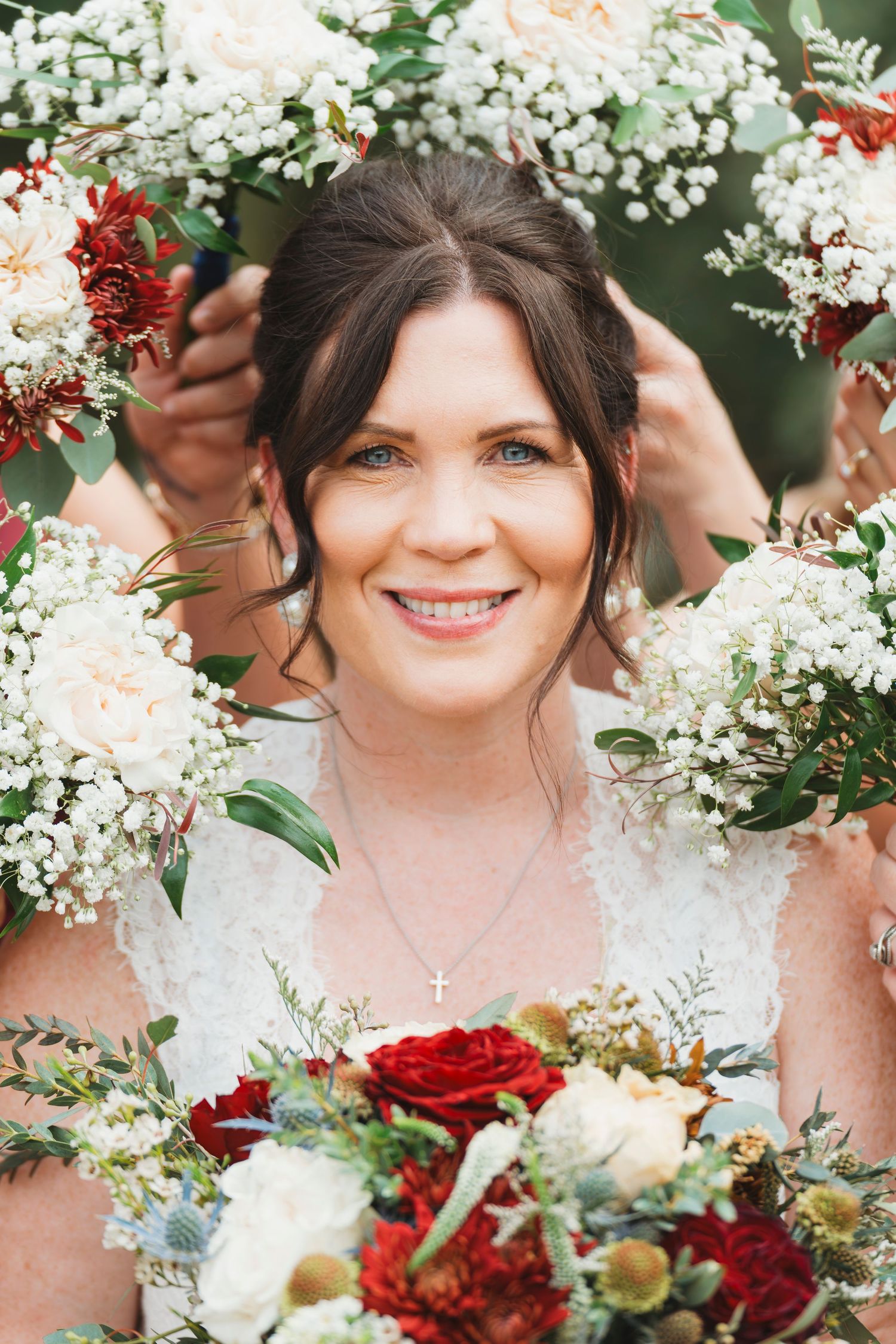 Bride with red rose bouquet wedding portrait Waco TX Sudden Joy Visuals