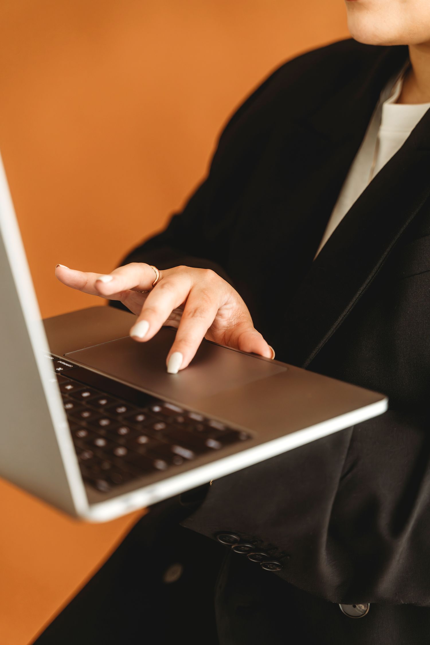 Hands typing laptop personal branding detail shot Waco TX Sudden Joy Visuals