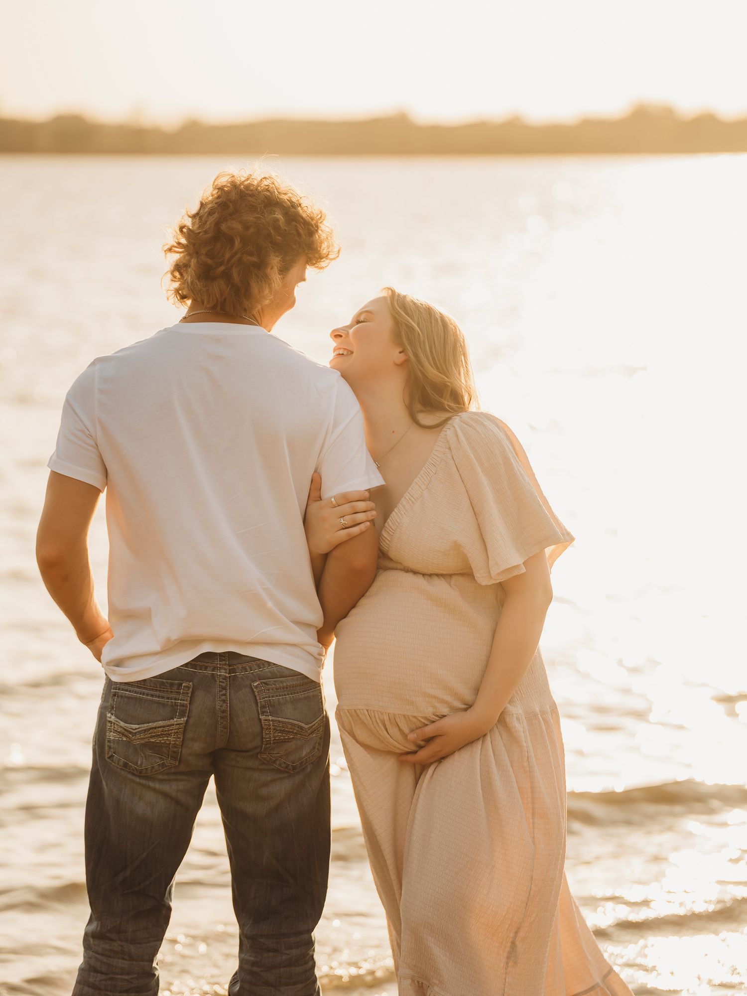 Maternity couple portrait by water lake session Central Texas Sudden Joy Visuals