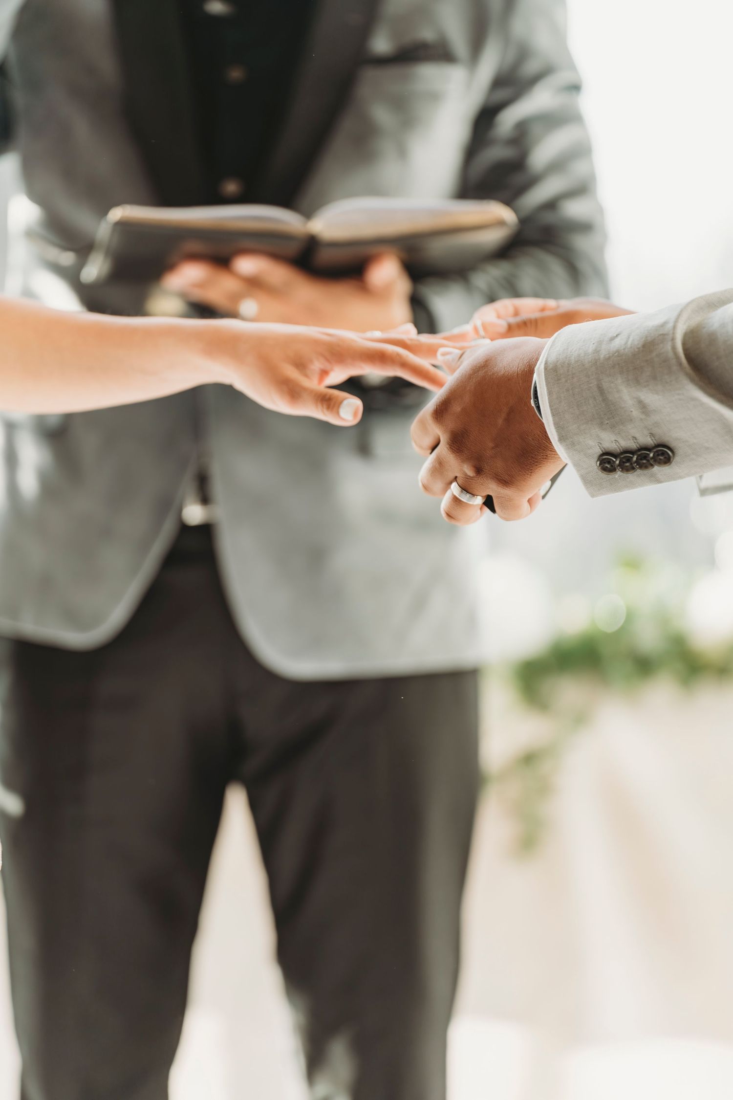 Bride and groom exchanging rings wedding ceremony detail Waco TX Sudden Joy Visuals