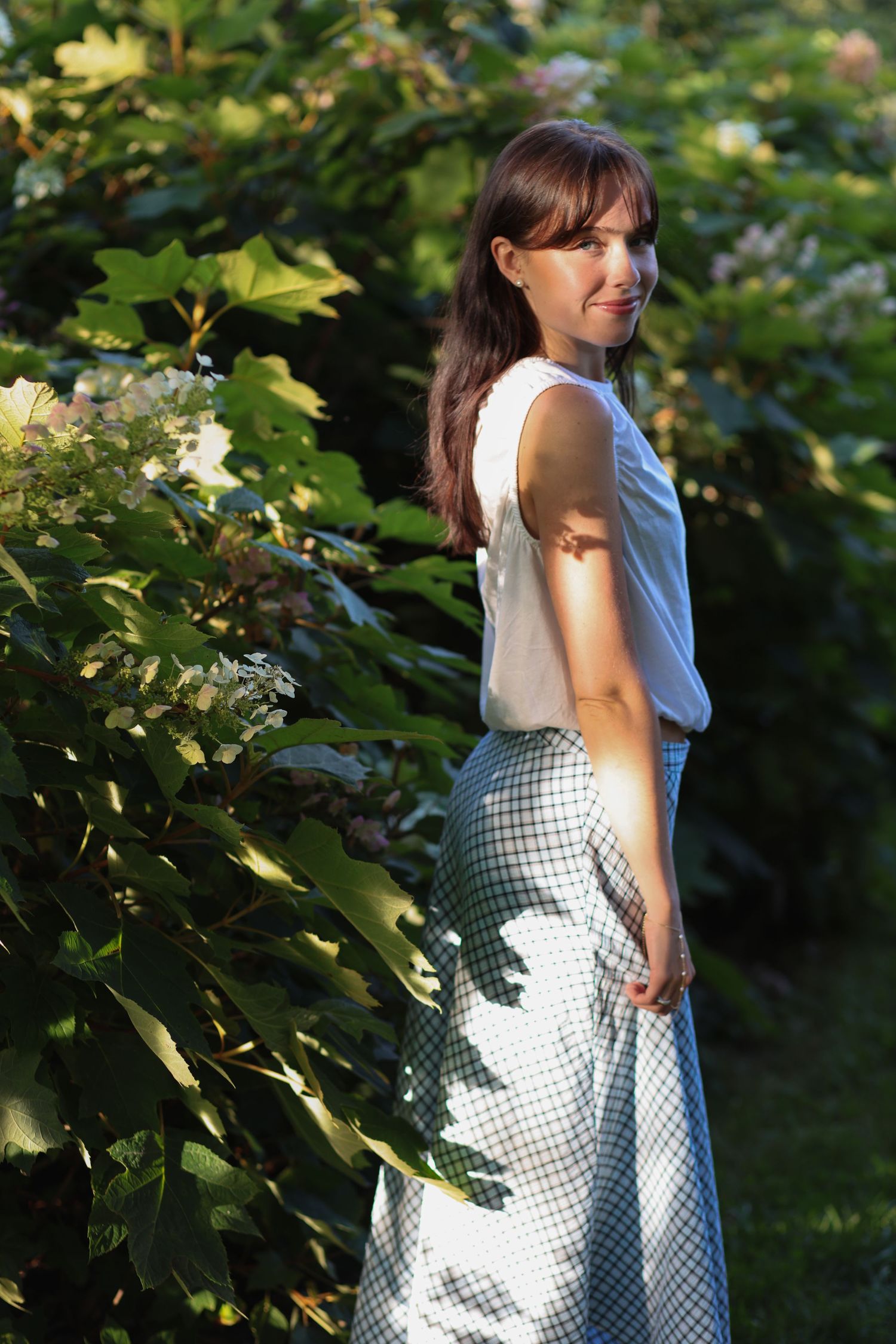 Natural portrait session at Historic Locust Grove in Louisville, Kentucky featuring a young woman in beautiful golden hour light.