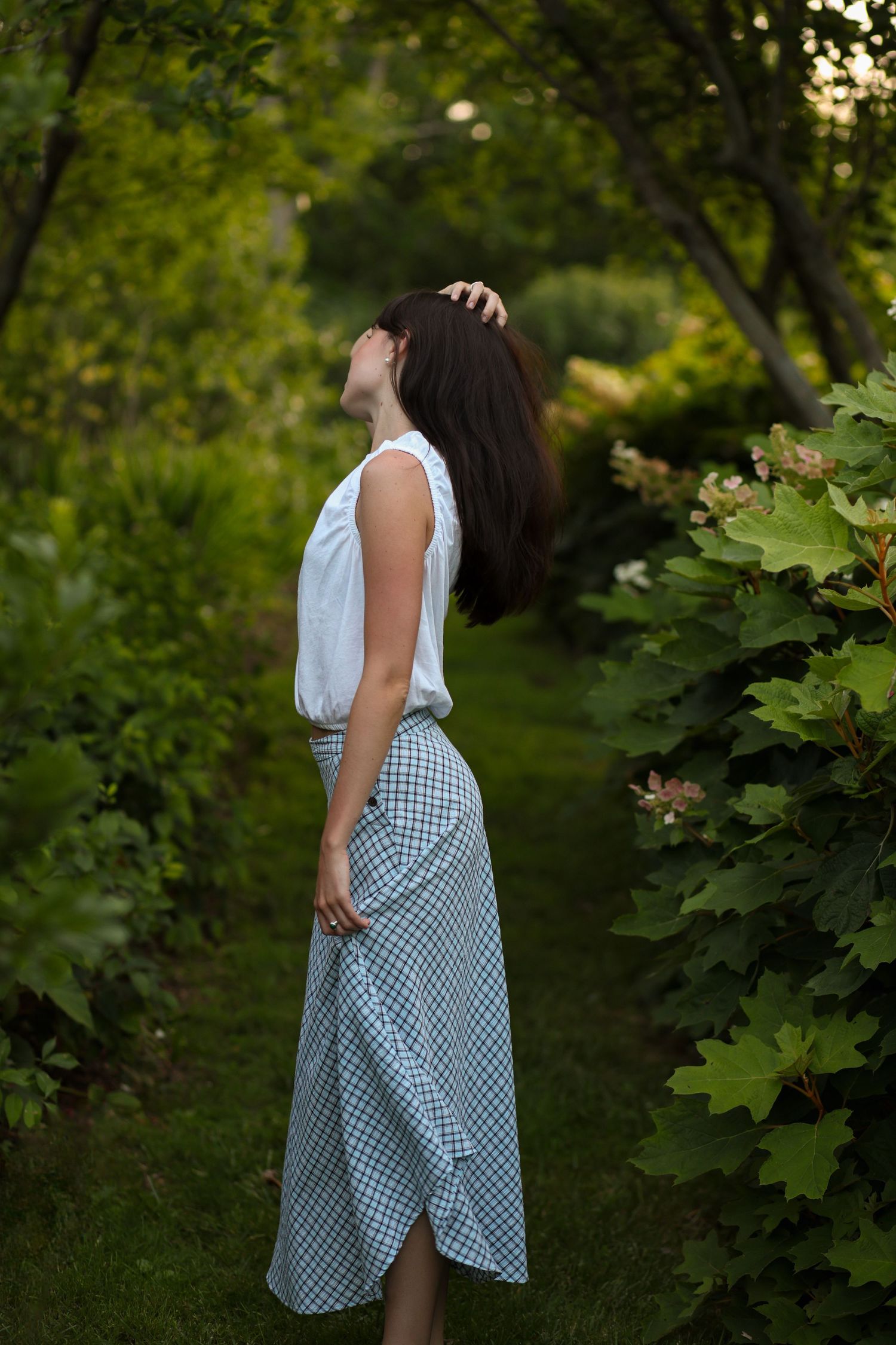 Natural portrait session at Historic Locust Grove in Louisville, Kentucky featuring a young woman in beautiful golden hour light.