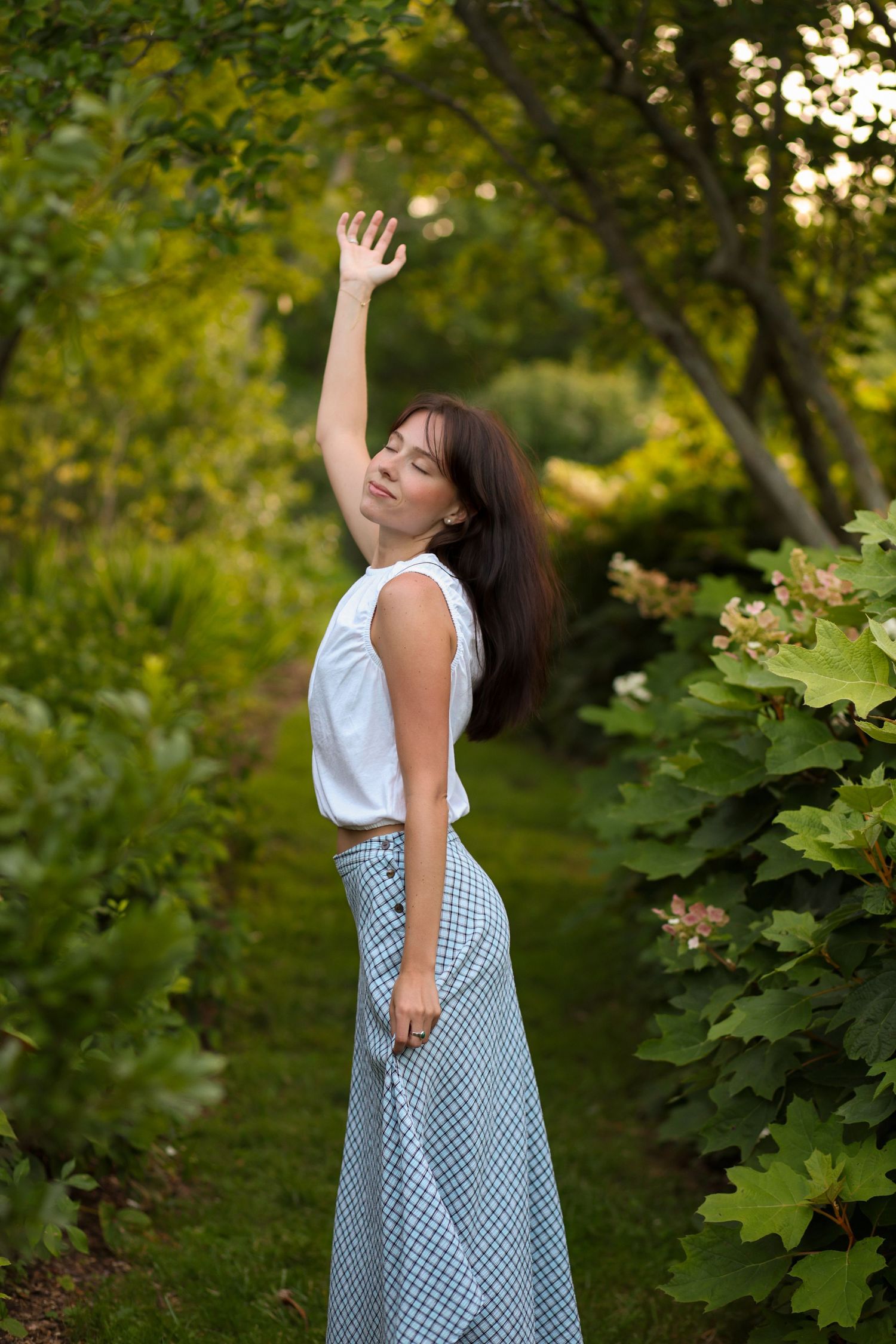 Natural portrait session at Historic Locust Grove in Louisville, Kentucky featuring a young woman in beautiful golden hour light.
