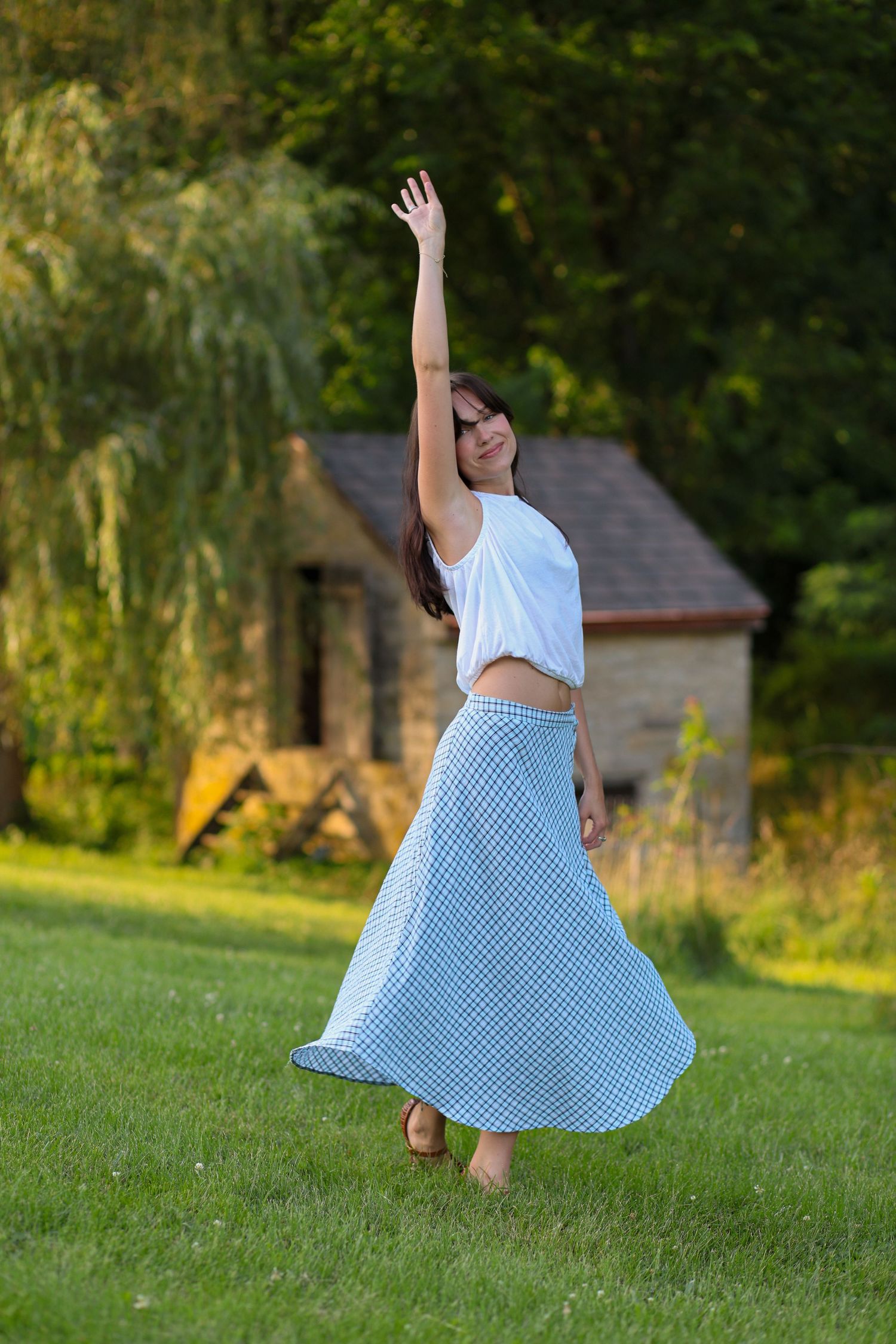 Natural portrait session at Historic Locust Grove in Louisville, Kentucky featuring a young woman in beautiful golden hour light.