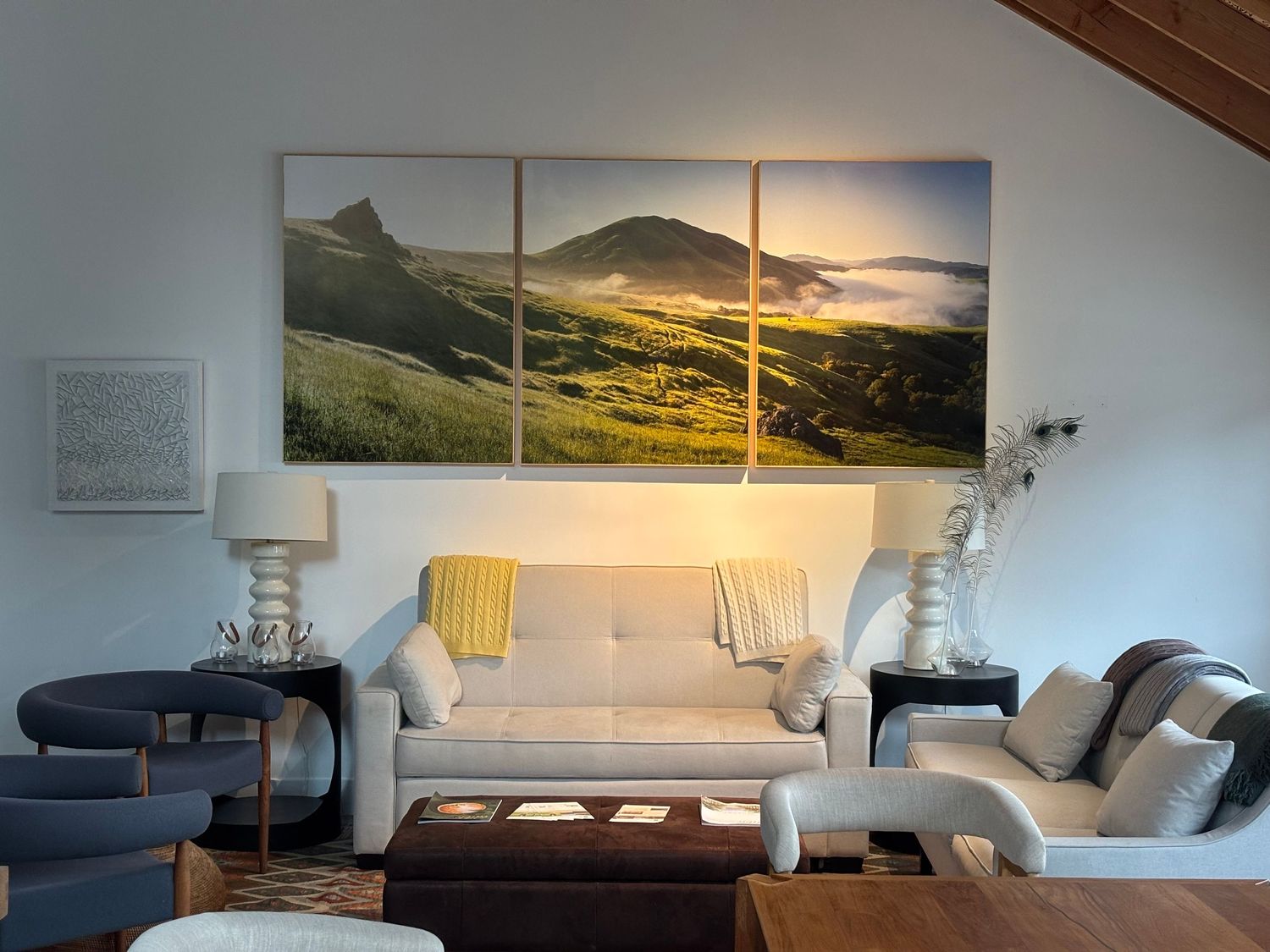 Triptych framed print, mounted to wood panel, golden mountain Marin County landscape hanging above white couch in modern living room.