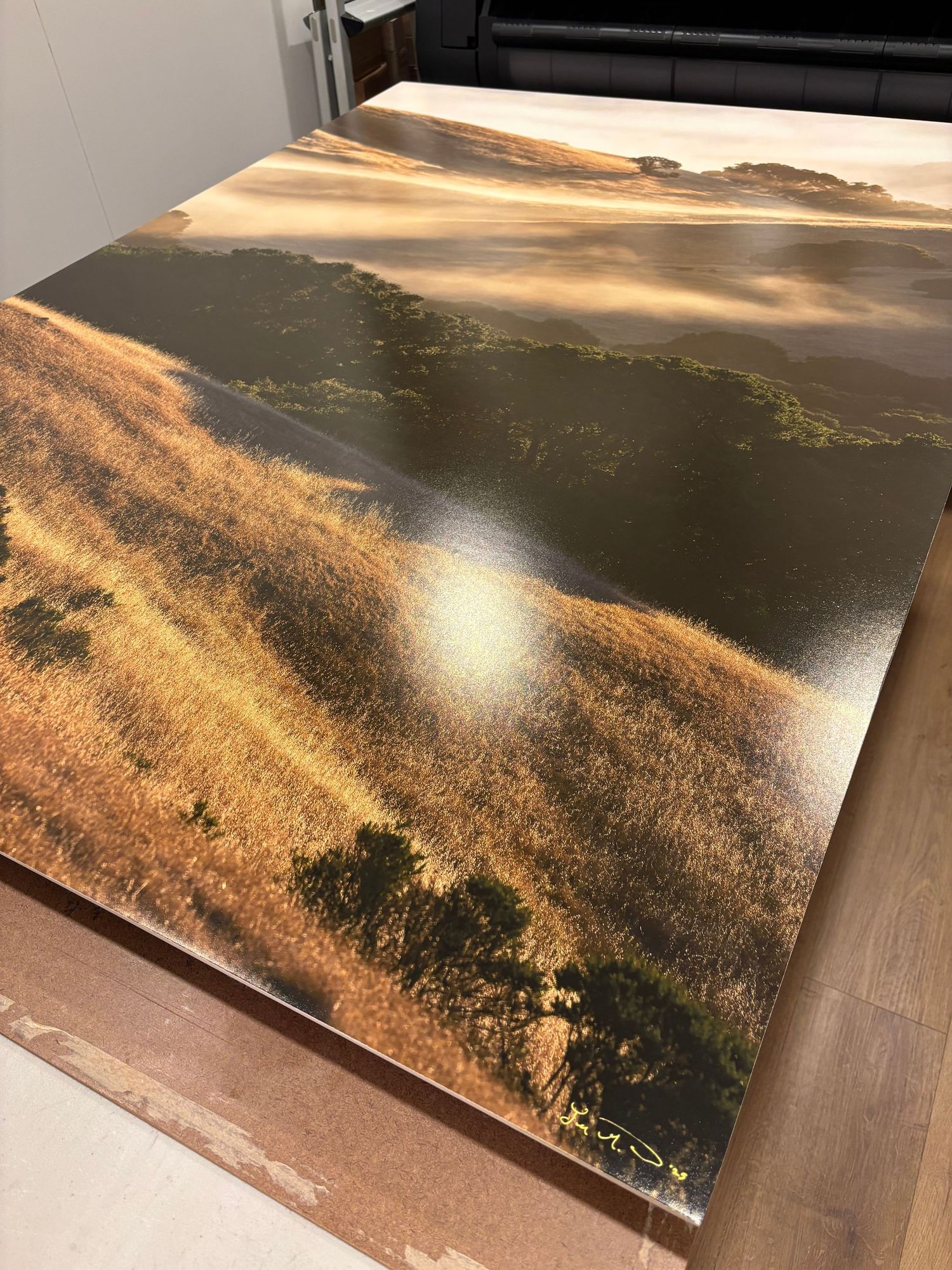 A mounted print to a wood panel, made in the Escaype Print Lab in Marin County, showing golden sunset landscape photography.