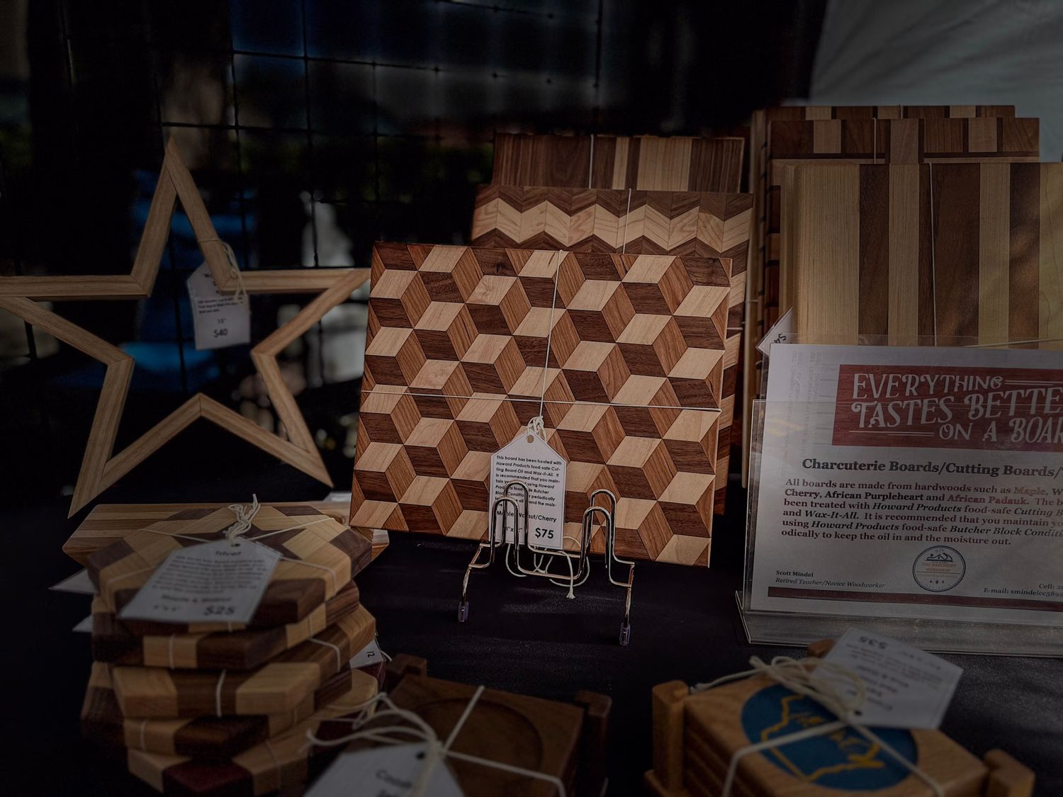 Wooden crafts display featuring a star decoration and geometric patterns.