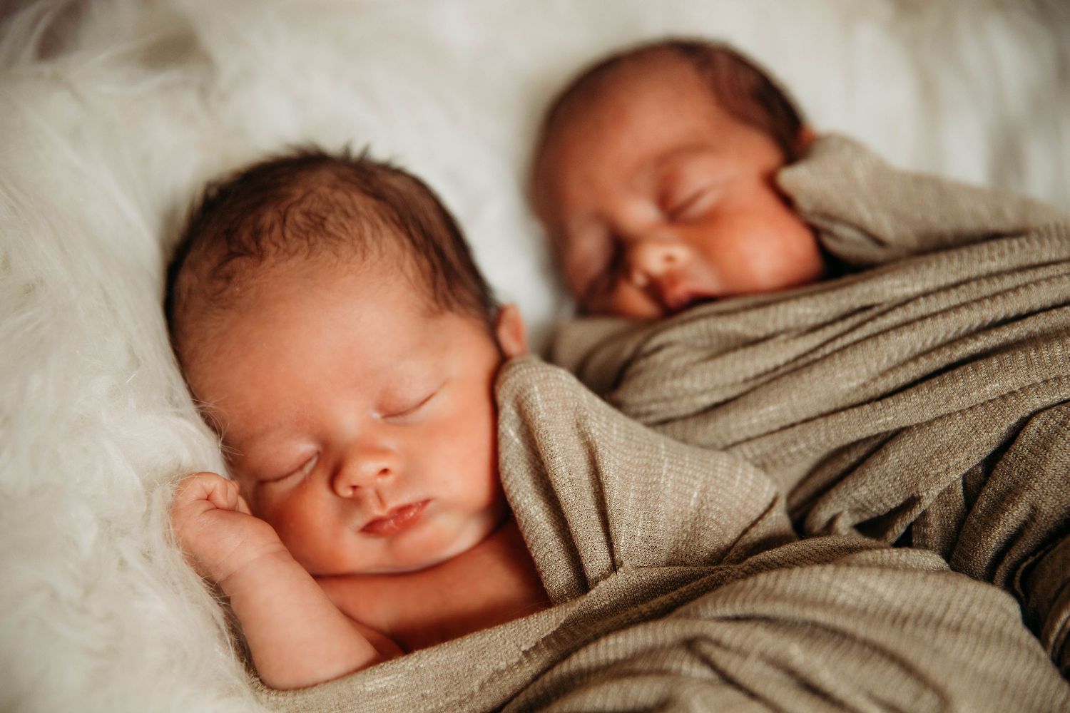 Photography - twins in a blanket.