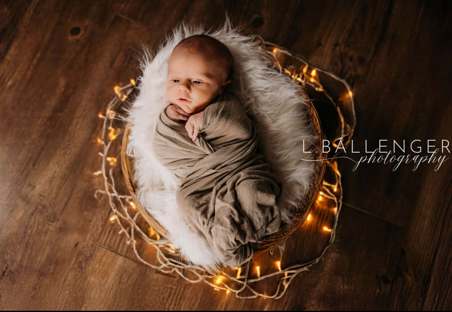 Photography - Newborn wrapped in fairy lights.