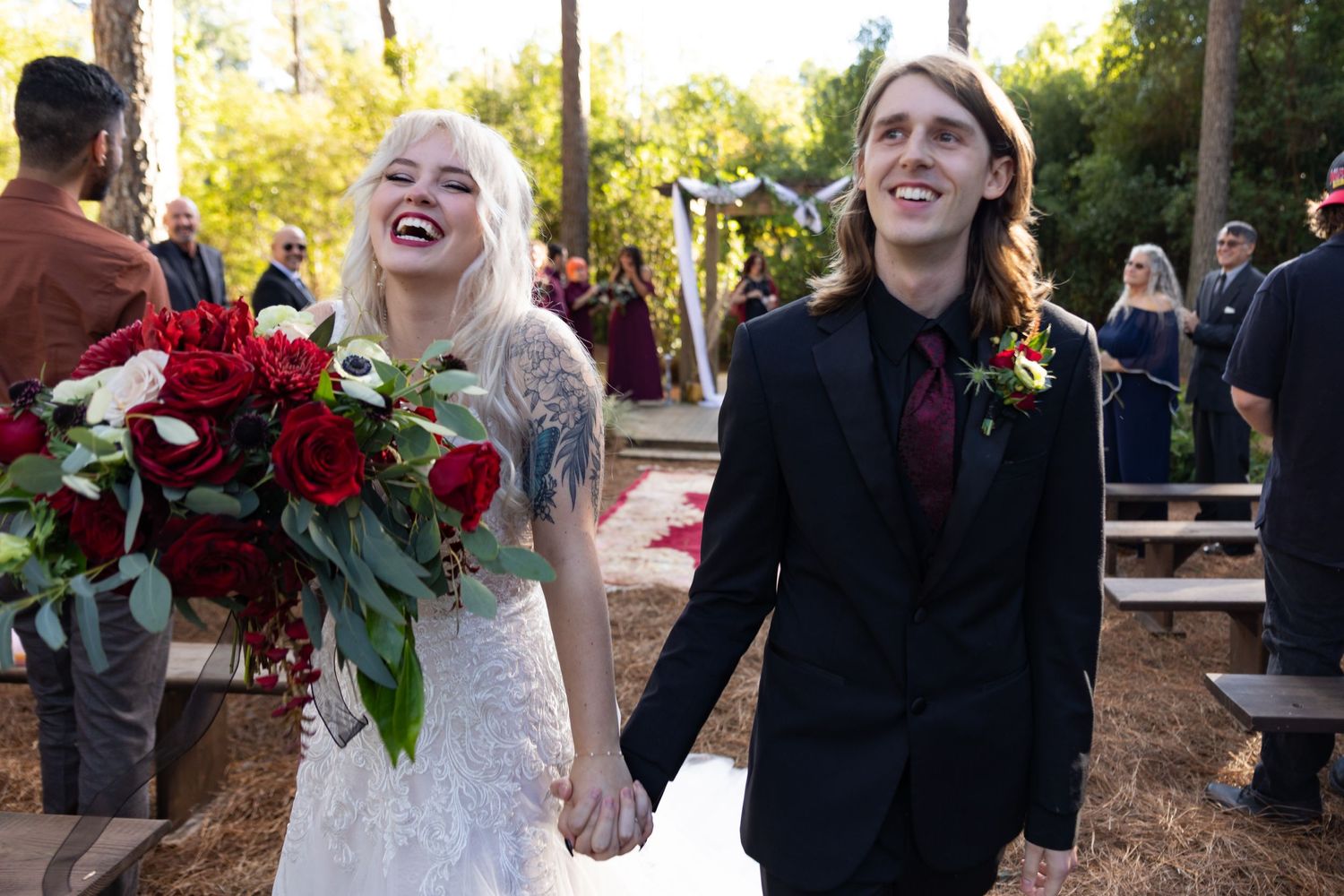 Bride and Groom walking hand in hand away from the altar with all the happiness in the world showing on their faces!