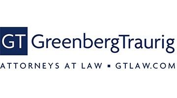 Law firm logo for Greenberg Traurig Attorneys at Law in dark blue text with white background.