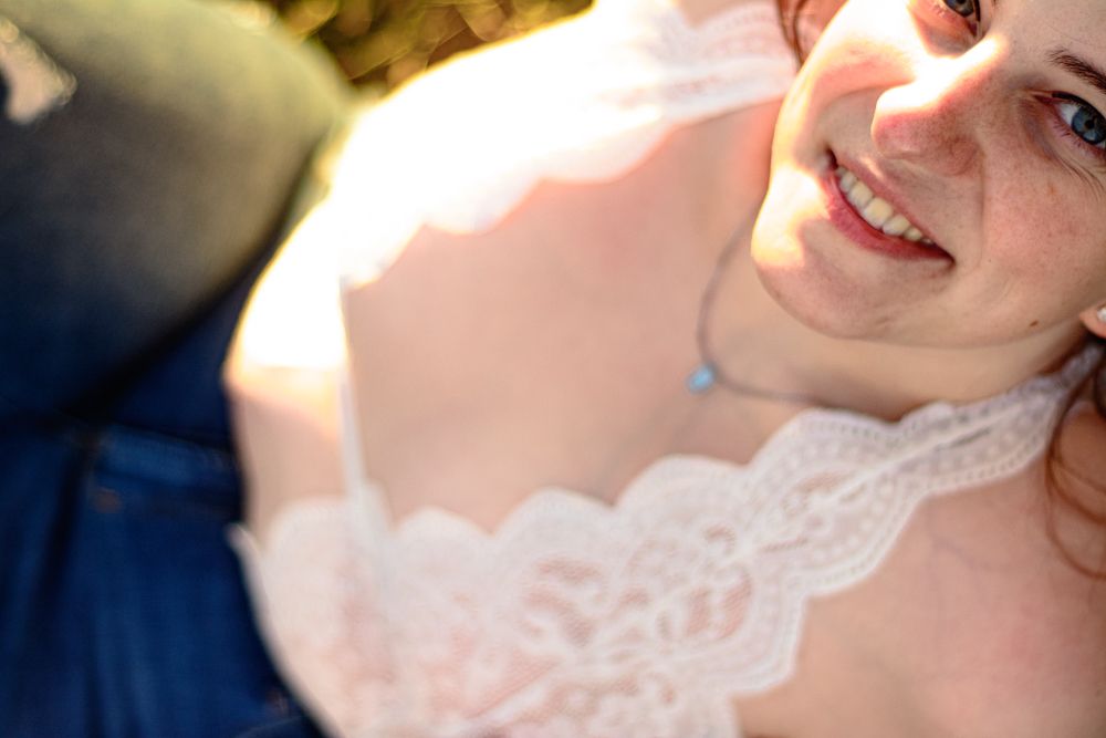 Close-up portrait with delicate lace details during golden hour photoshoot.