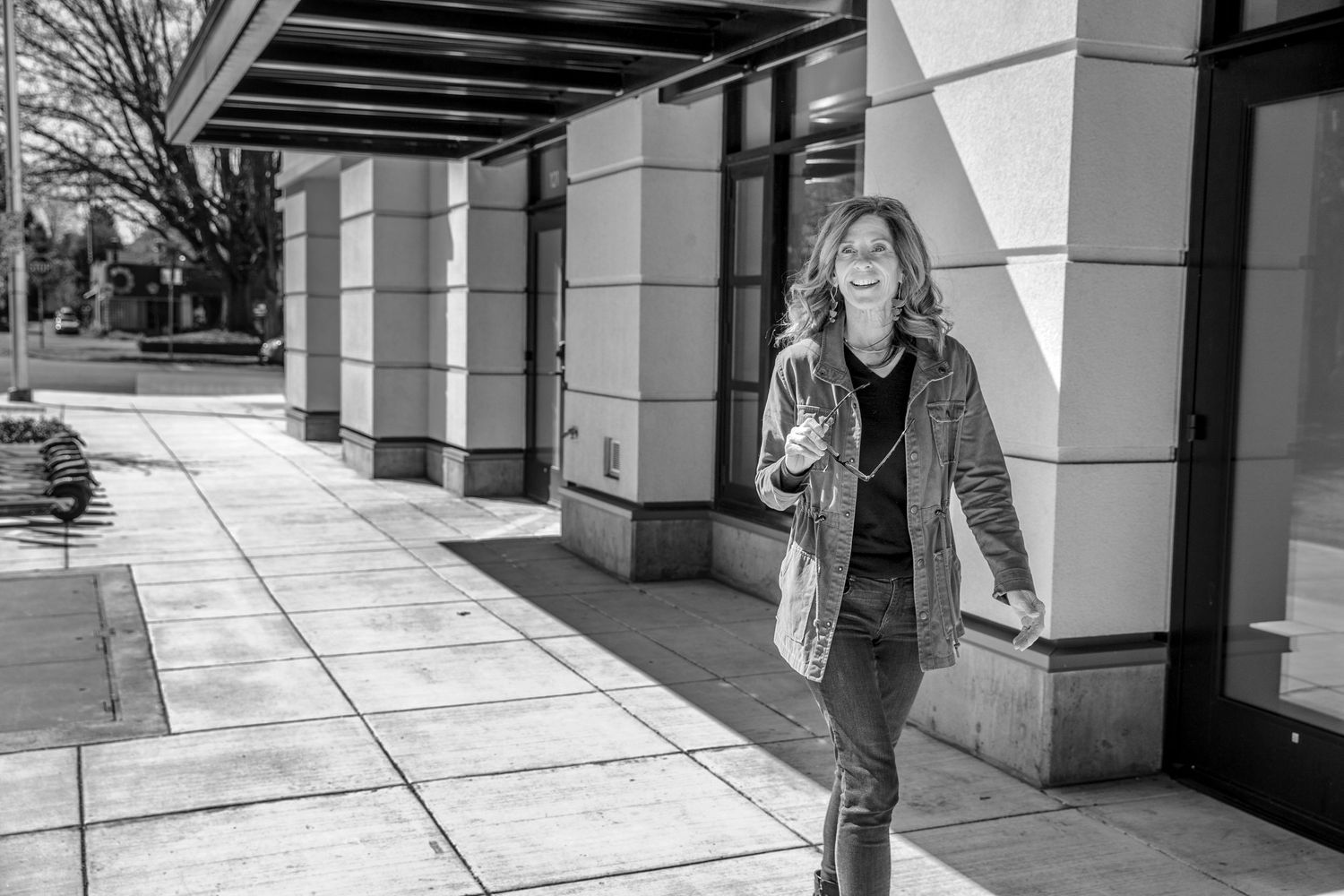 Black and white architectural series showing walkways and columns with dramatic shadows.