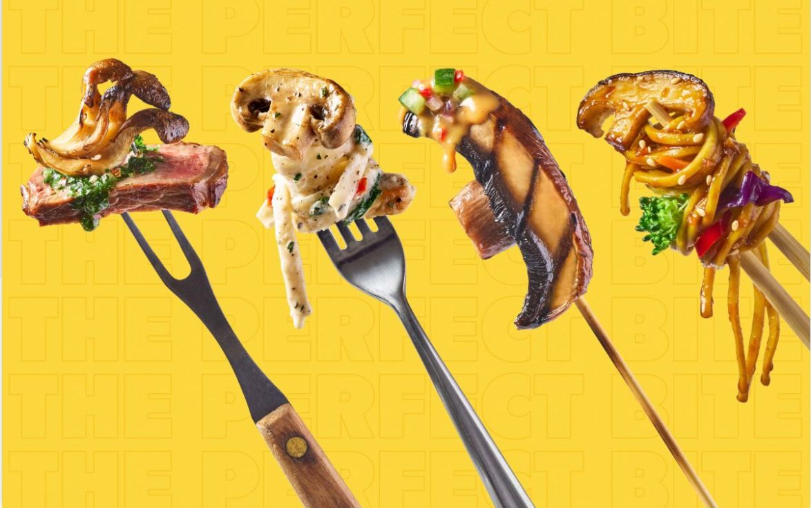 Four forks hold different types of food including a hot dog, burger, and other sandwiches against a bright yellow background.