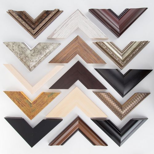 Collection of various picture frame corners in different finishes and styles arranged on white background.