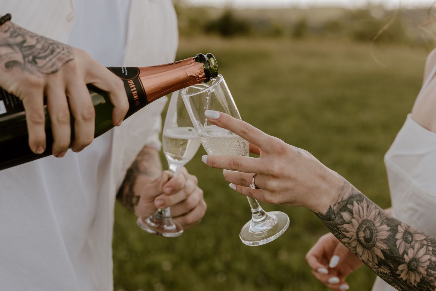 Newly engaged couple show off their rings after a surprise proposal in Miamisburg, OH. Photographed by Vicci Photo of Dayton OH