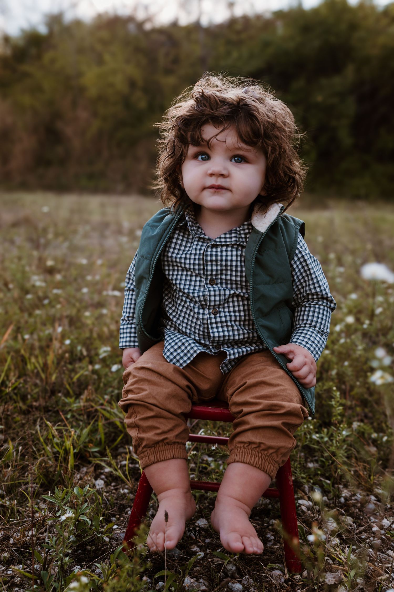 Portrait of 10 month old during a family session at Oakes Quarry in Fairborn, OH. Photographed by Vicci Photo of Dayton, OH