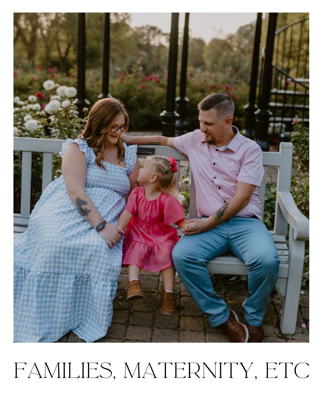 A colorful, in the moment, family photo of three at the Columbus Park of Roses in front of the observation tower.