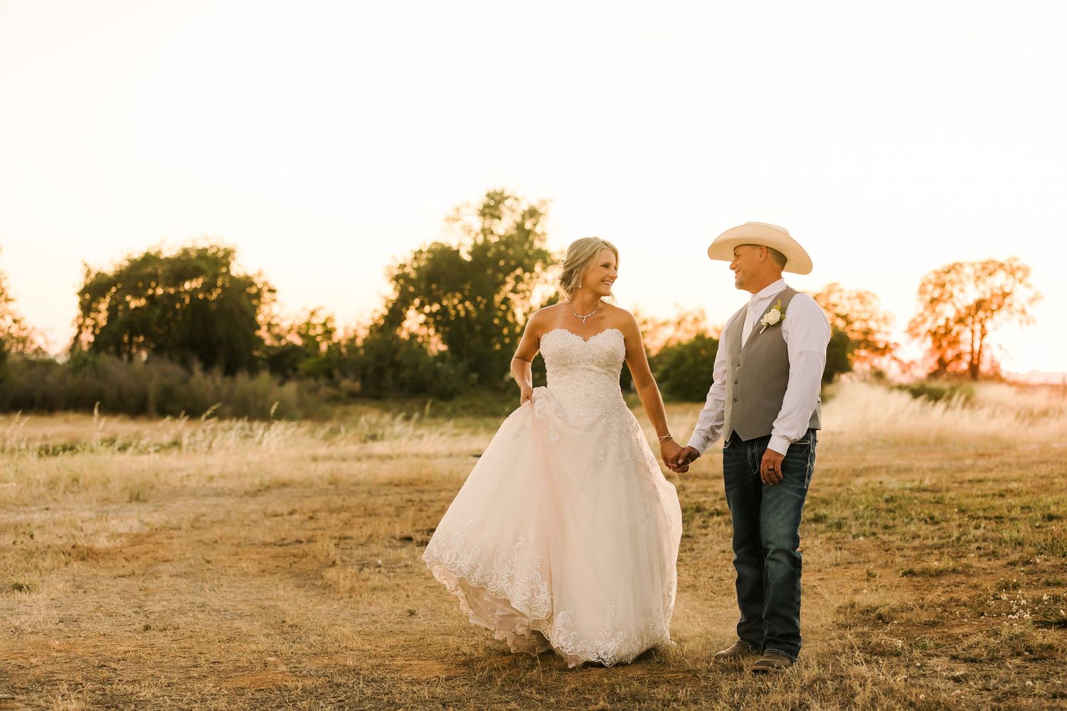 Cowboy couple on their wedding day in Northern California captured by Ranch Wedding Photographer Lauren Ann Photography