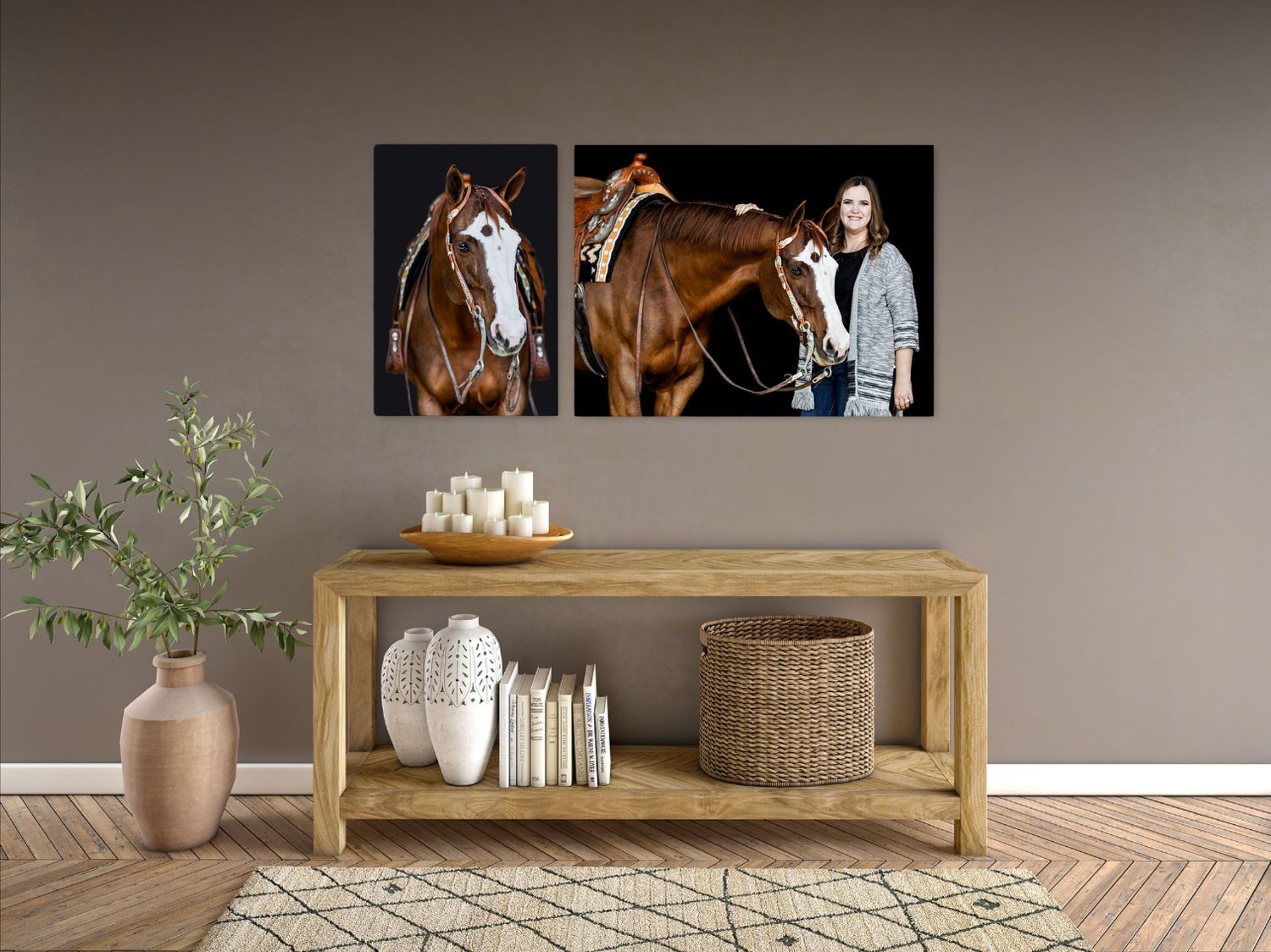 Two large equestrian-themed canvas prints displayed above a wooden console table with decorative accessories.