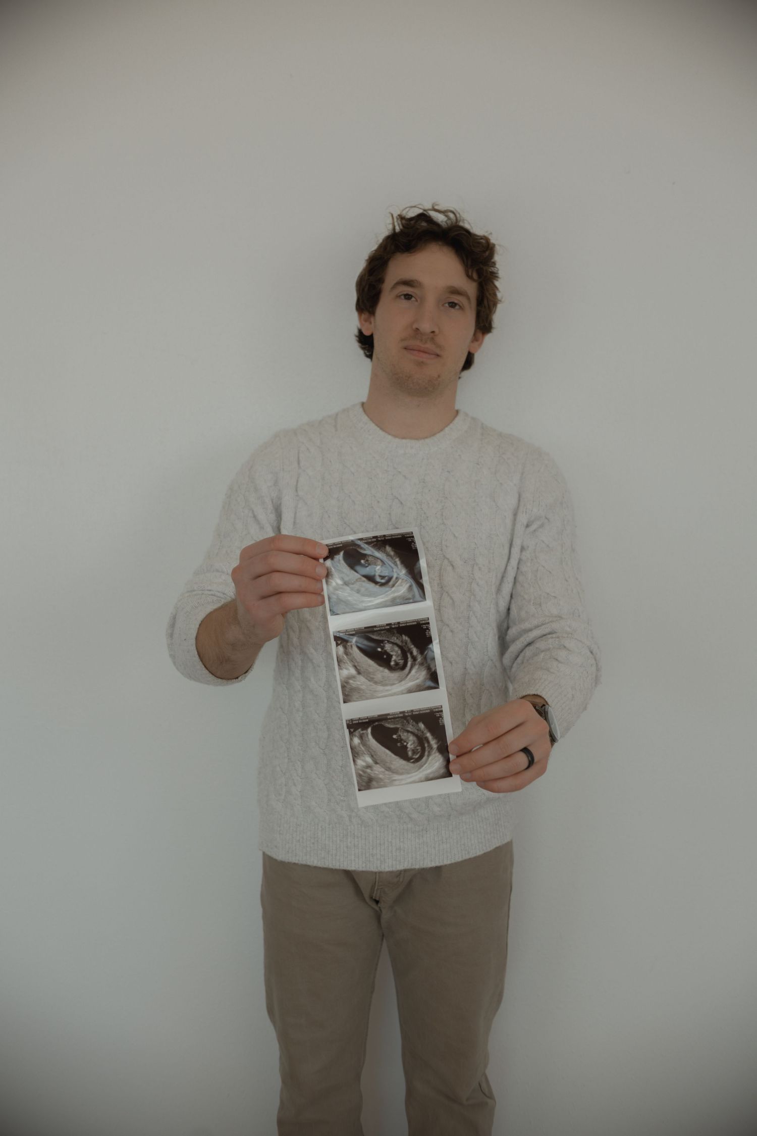 Dad holding sonogram in Denton, Tx