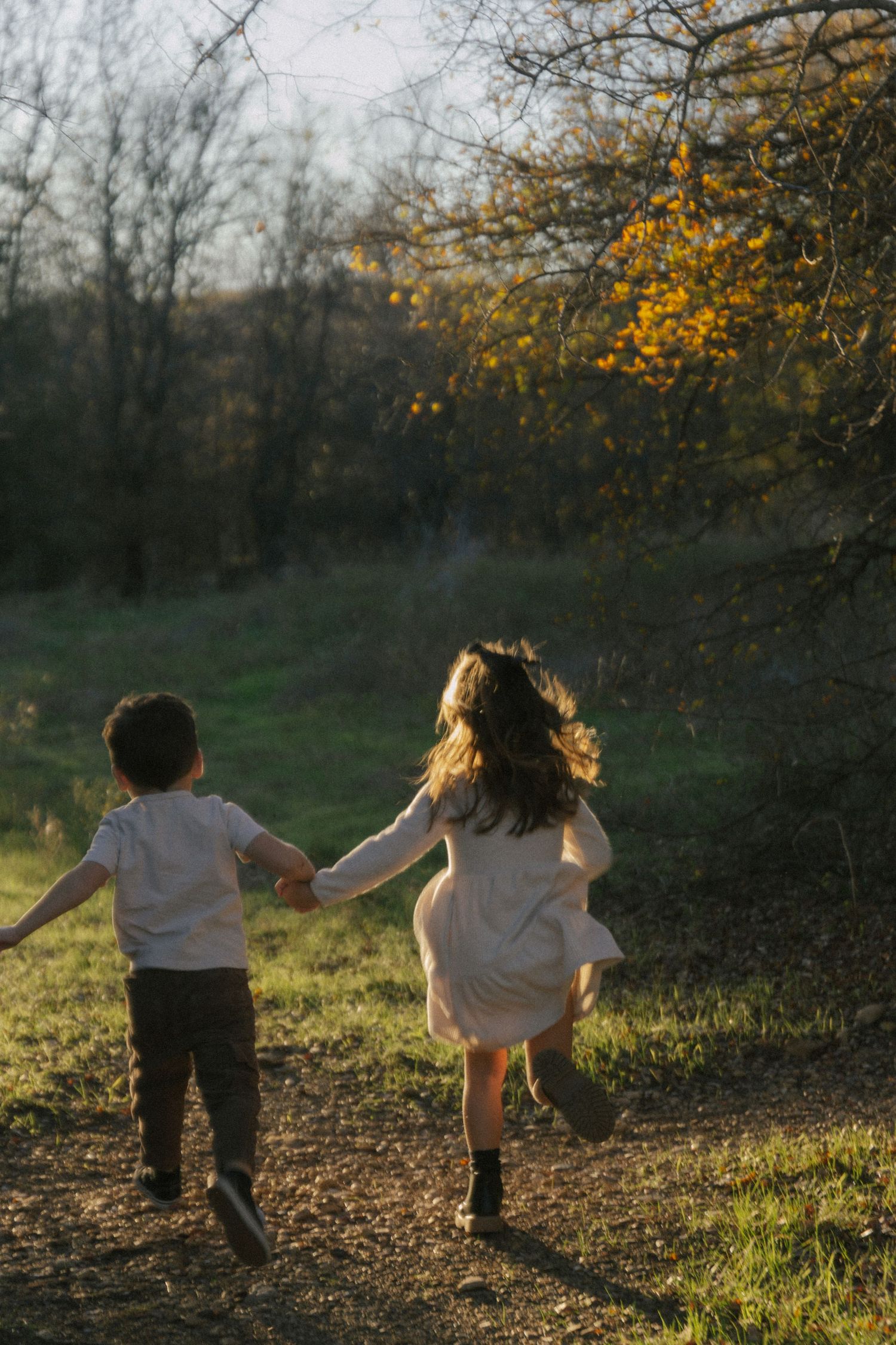 Argyle, TX photoshoot of kids running in a field