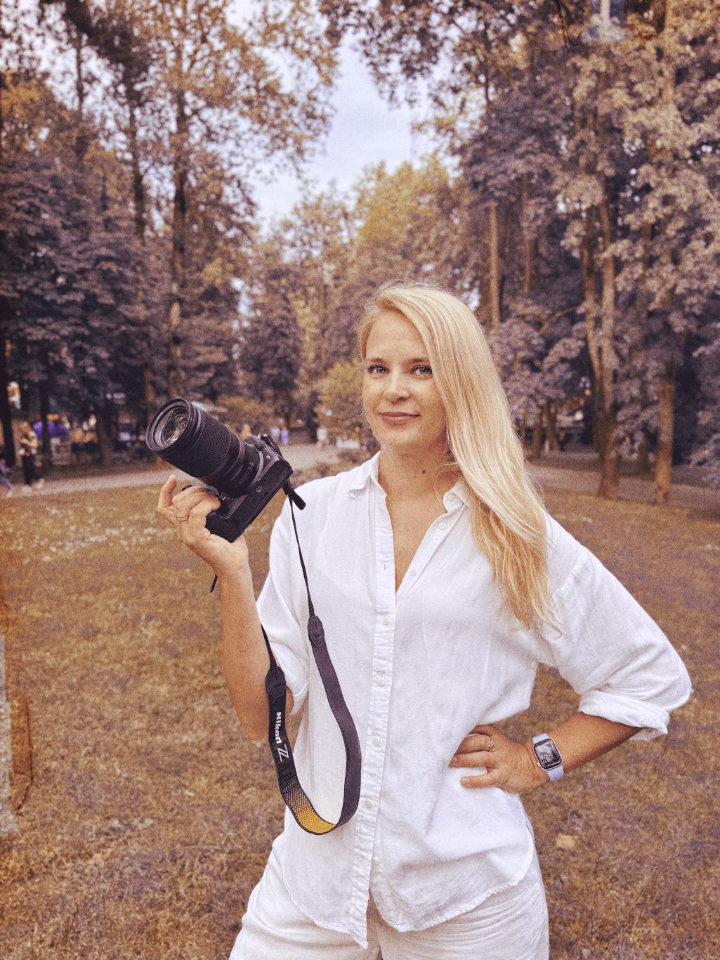 photographer with camera in hand