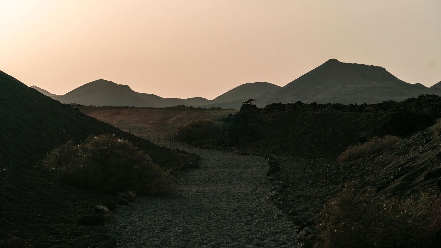 Black sand volcanic beach Lanzarote dramatic 
landscape — cinematic photography Del Puerto Creative