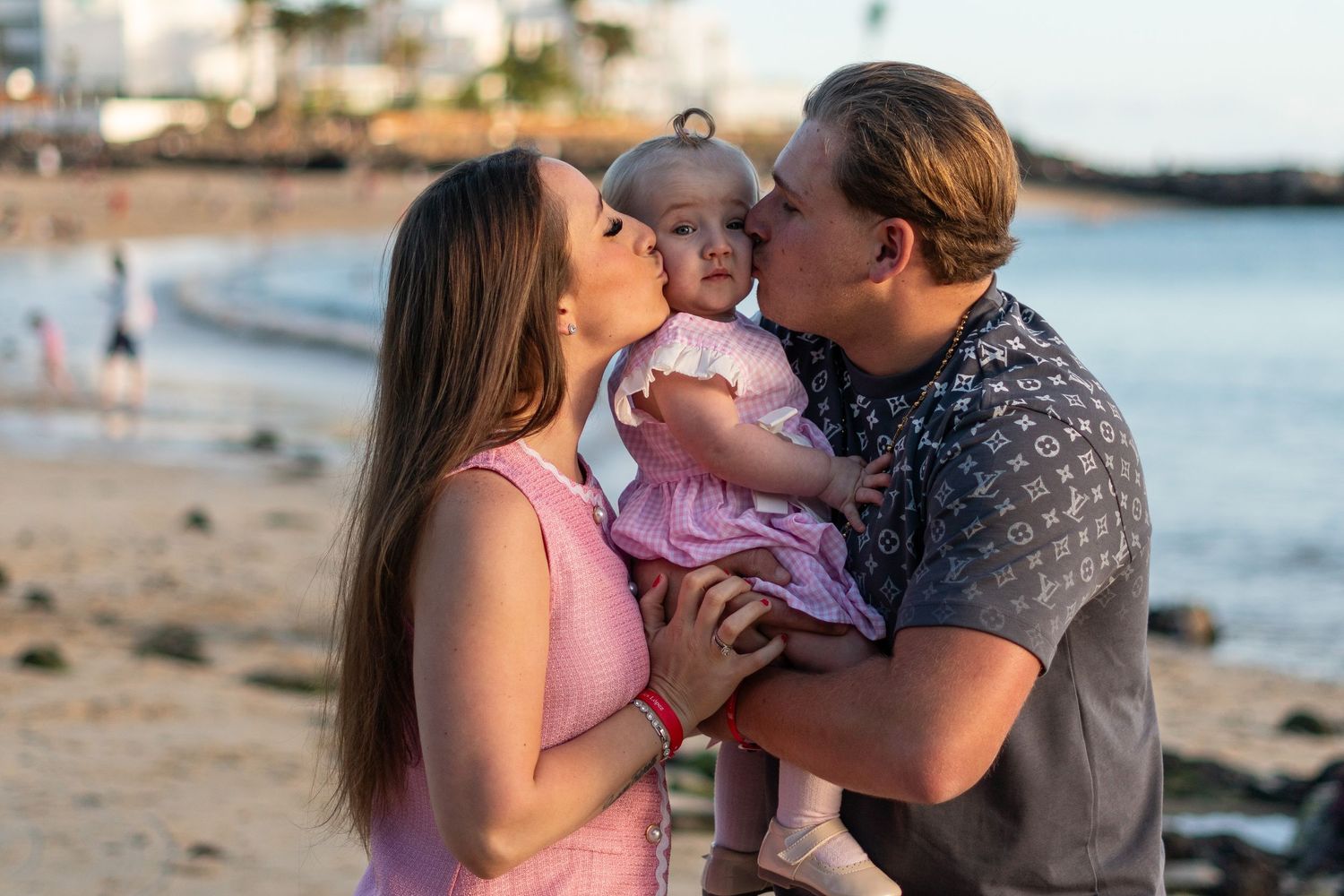 Family photoshoot on Playa Blanca Beach Lanzarote at 
sunset — natural light holiday photography session