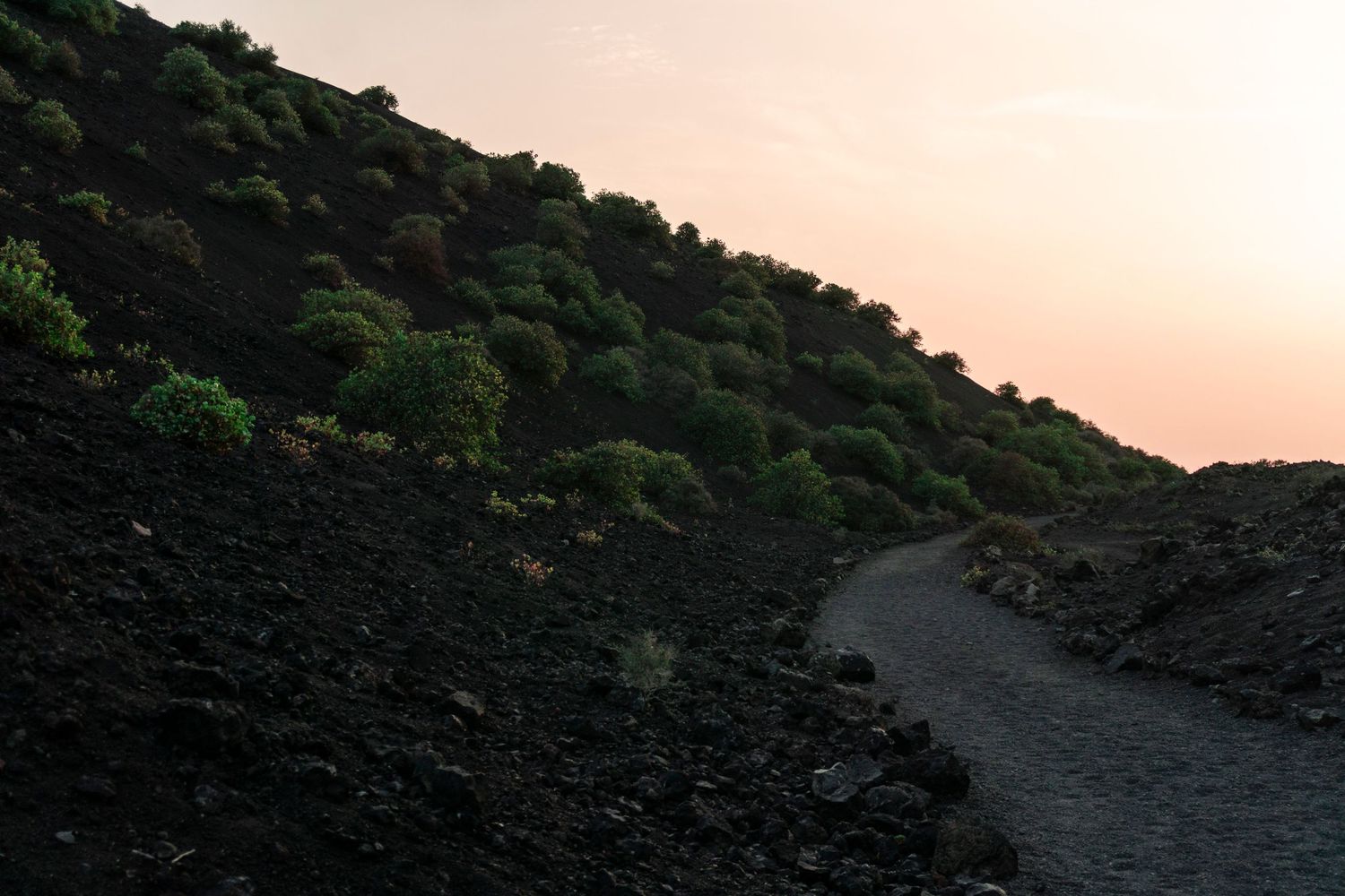 Black sand volcanic beach Lanzarote dramatic 
landscape — cinematic photography Del Puerto Creative