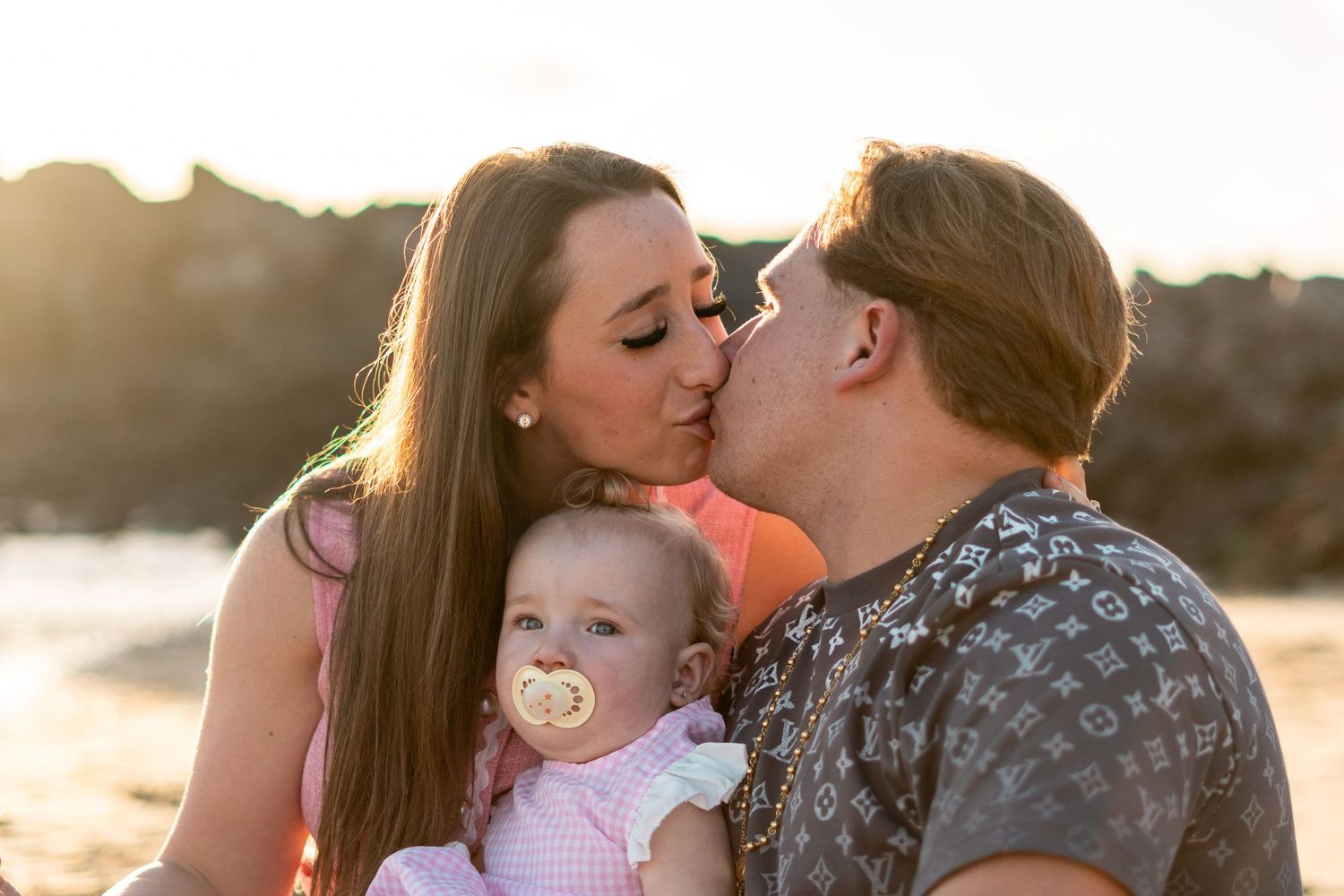 Family photoshoot on Playa Blanca Beach Lanzarote at 
sunset — natural light holiday photography session