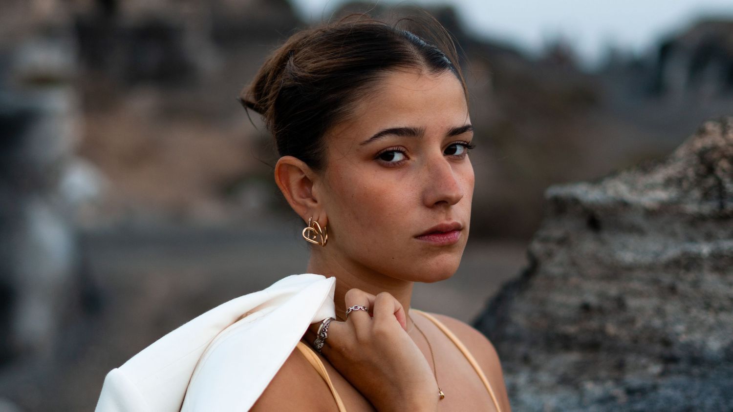 Outdoor model portrait session on volcanic landscape 
Lanzarote — editorial fashion photography