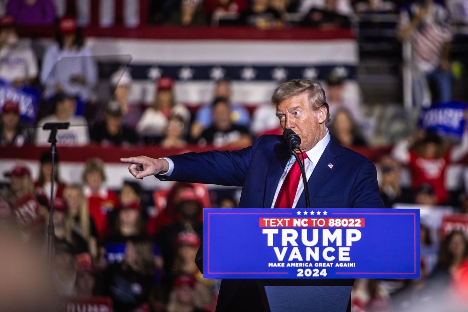 Donald Trump points to the crowd at a Trump Vance 2024 campaign rally in North Carolina.