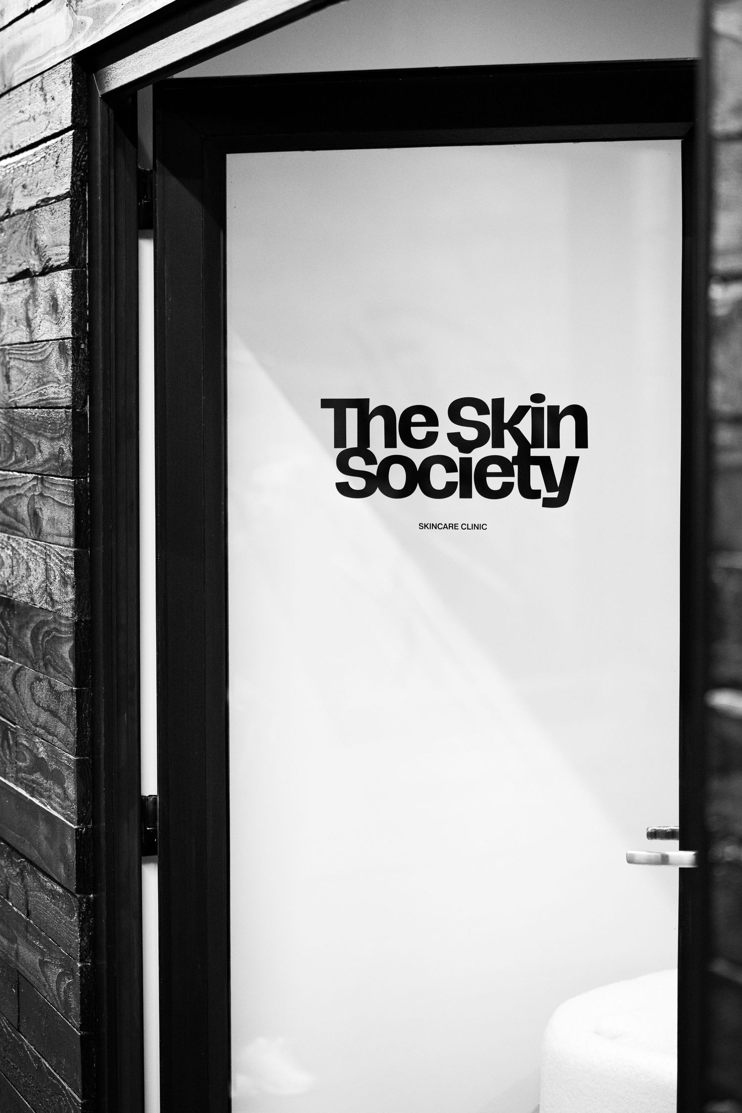 Business branding on door in black and white