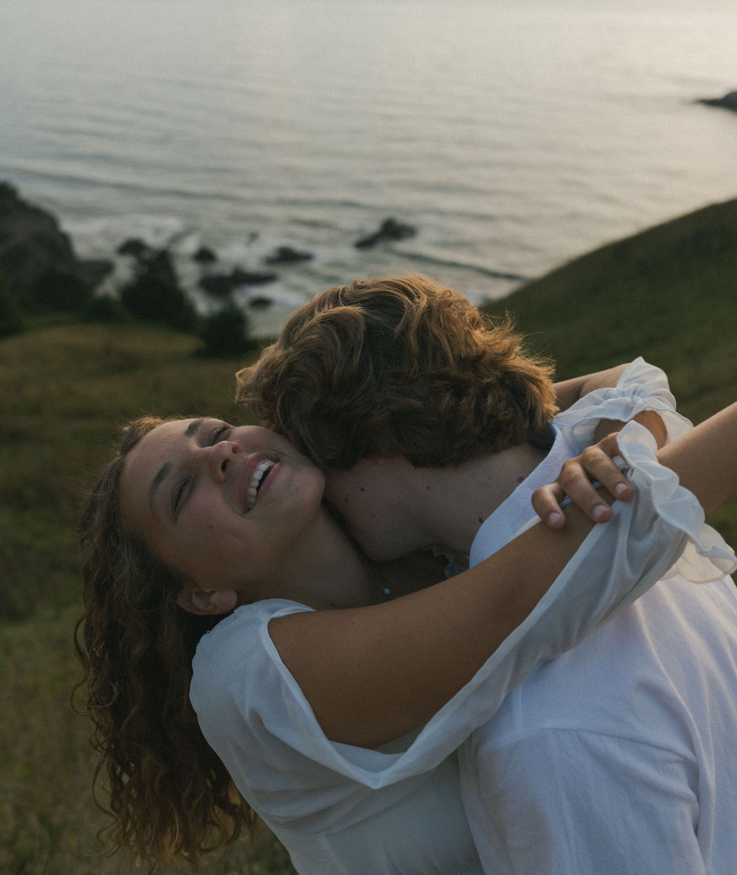 Cinematic engagement portrait at God's Thumb near Lincoln City, Oregon.