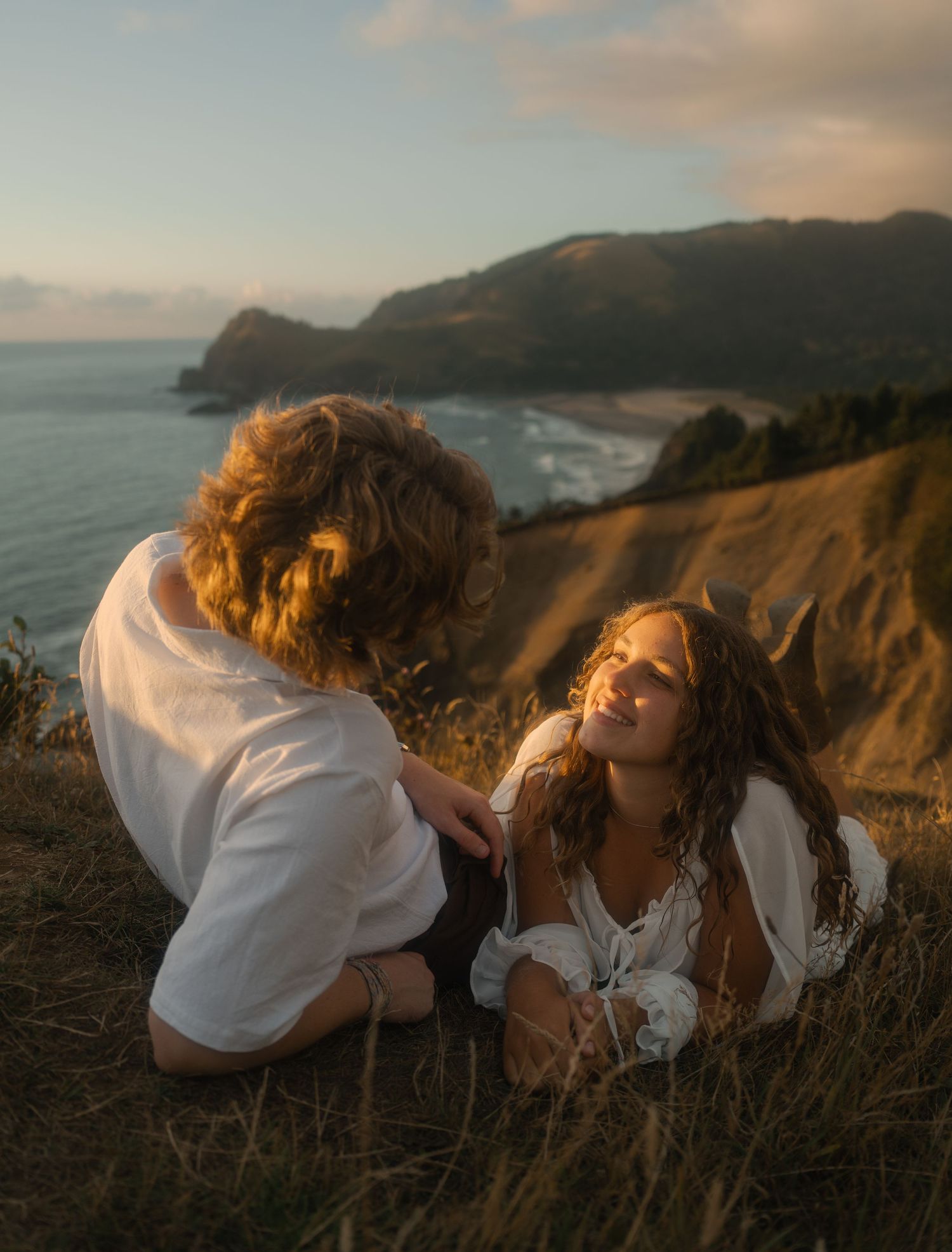 Couple hiking God's Thumb on the Oregon Coast
