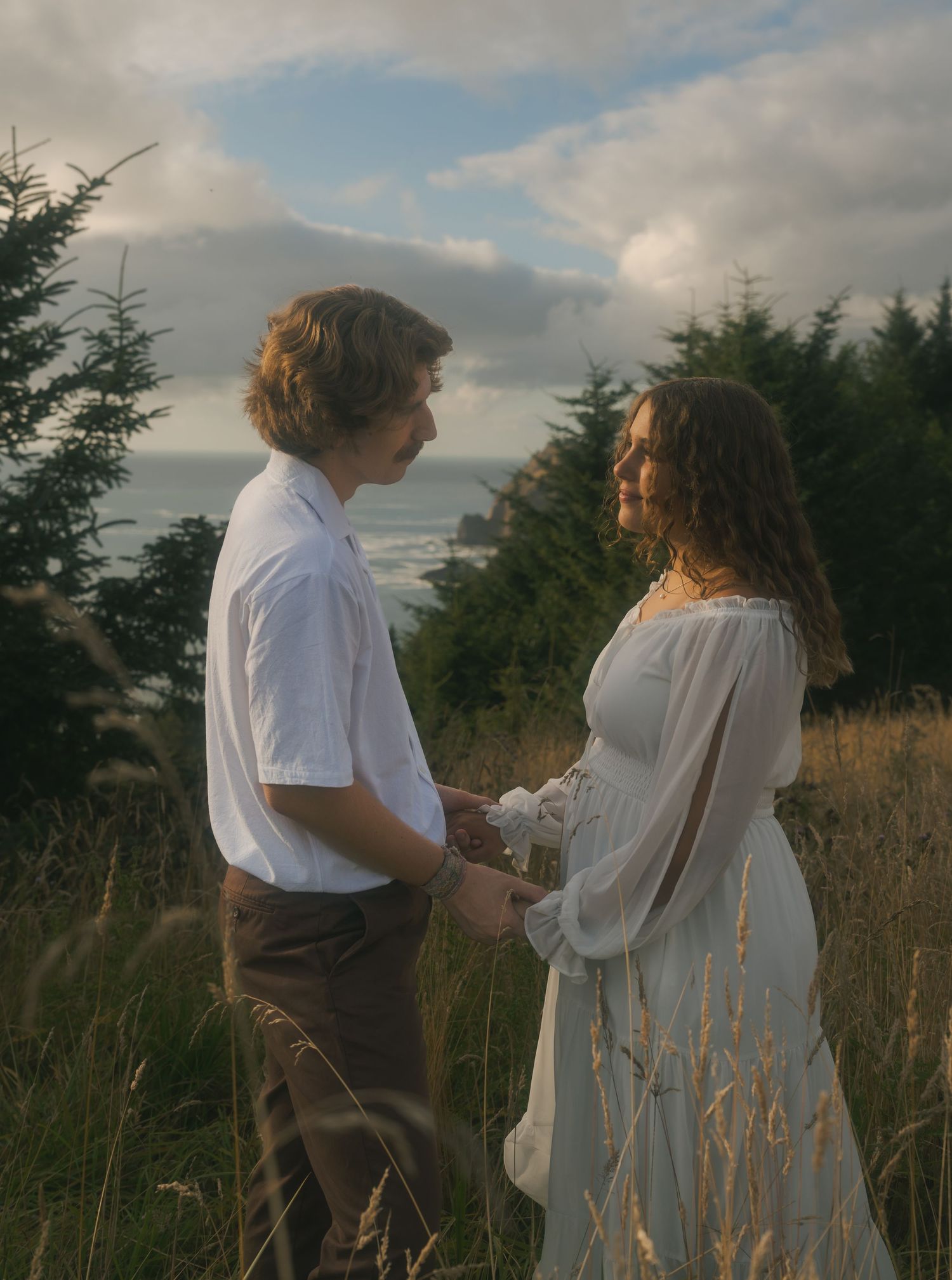 Cinematic engagement portrait at God's Thumb near Lincoln City, Oregon.