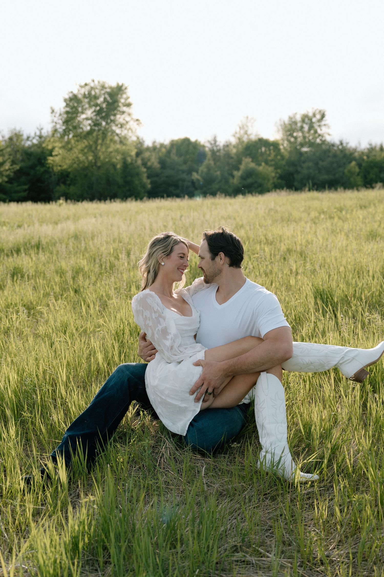 Beautiful open field, dusk, couple session