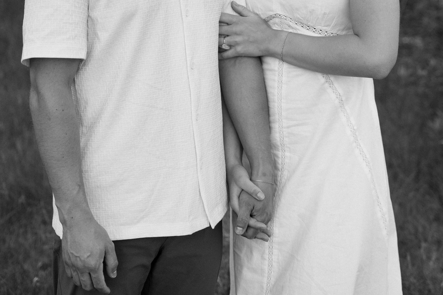 engagement shoot in Hudson Wisconsin, engagement session, black and white, holding hands, engagement ring